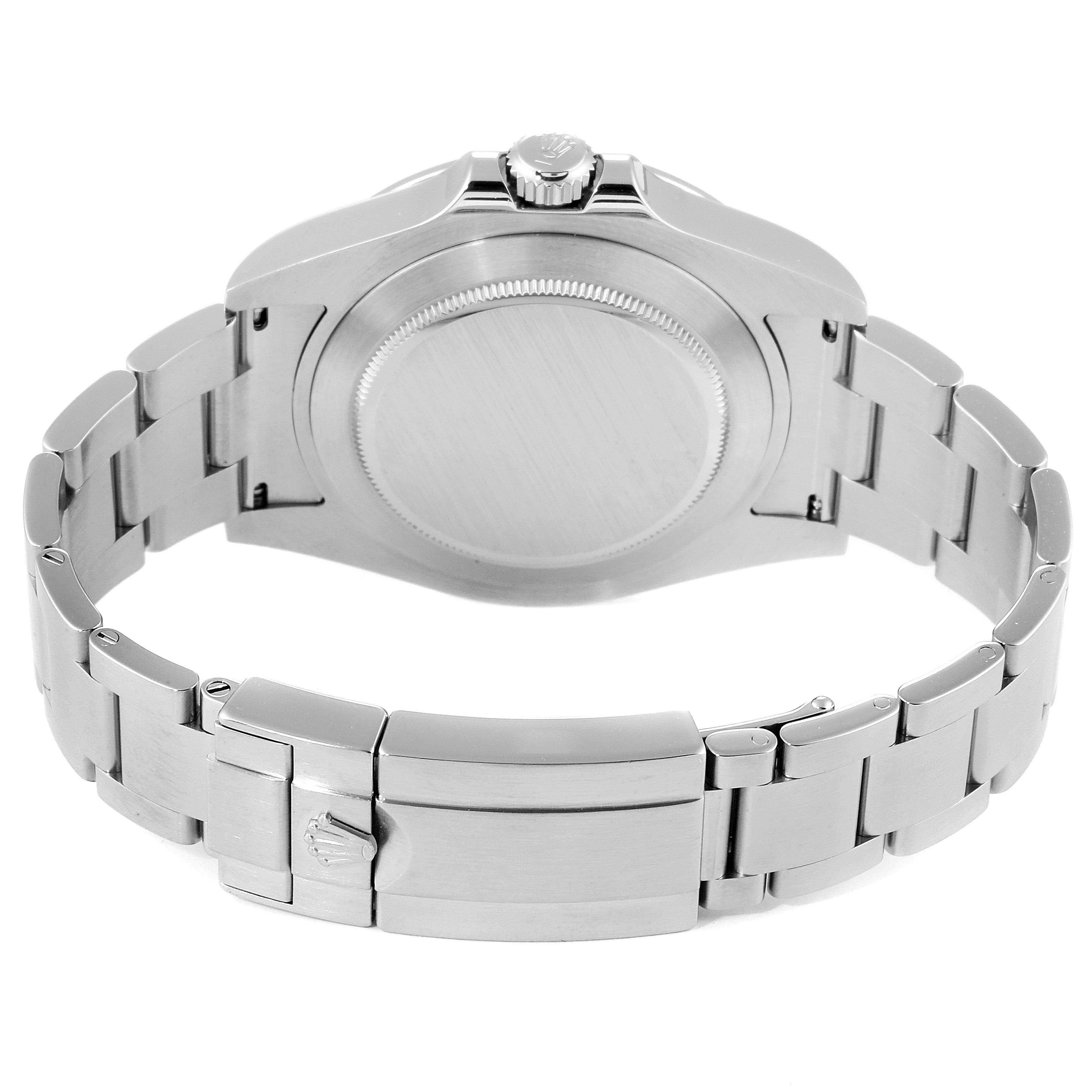 The photo shows the back view of a Rolex Explorer 216570 Men
s Stainless Steel Black Dial 216570 Men
s Stainless Steel Black Dial watch, highlighting the case back and metal bracelet.