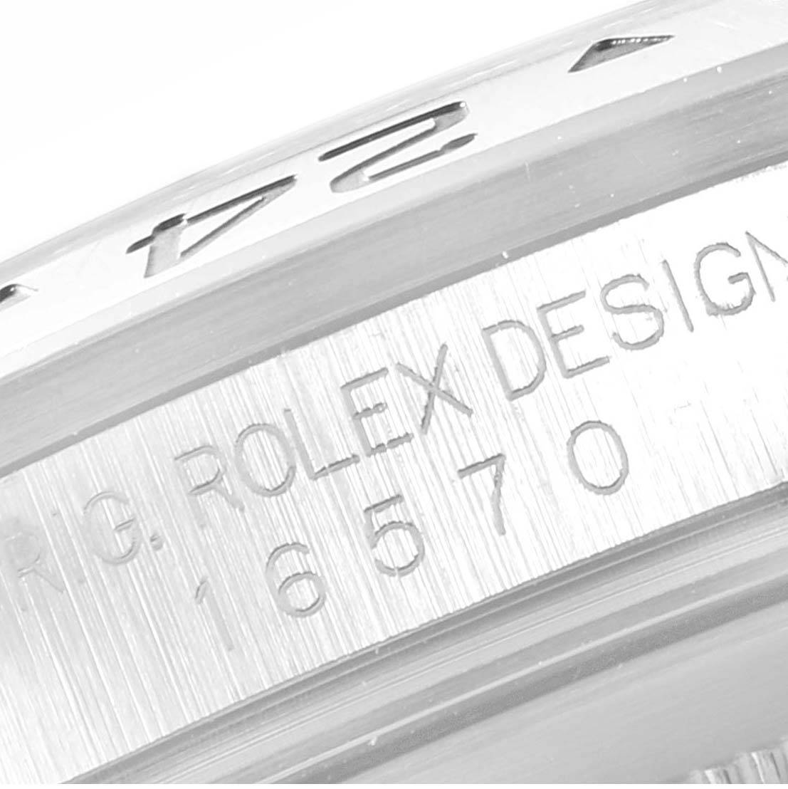 This close-up angle of the Rolex Explorer 16570 Men's Stainless Steel Black Dial 16570 Men's Stainless Steel Black Dial shows the engraved design details on the watch's case side.
