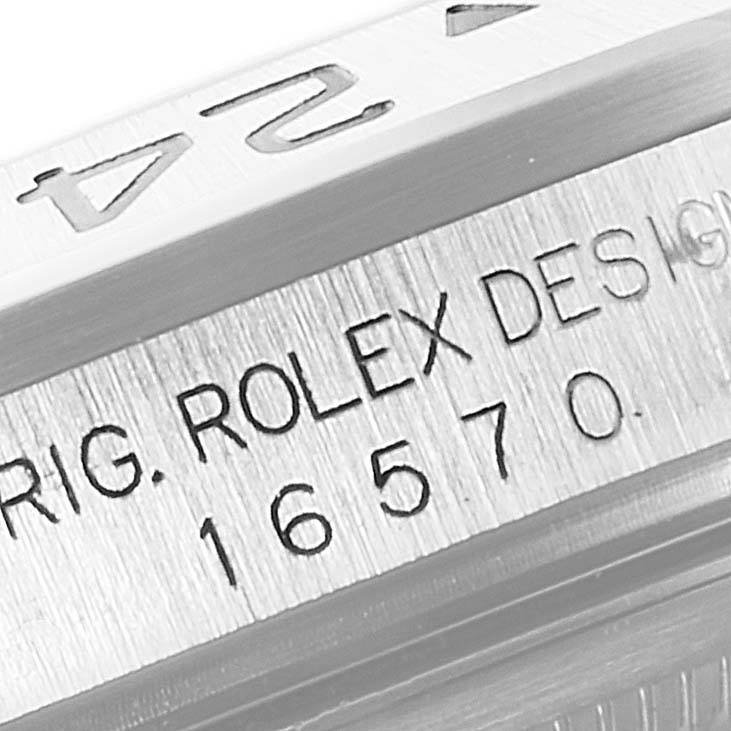 This close-up image shows the engraved model number and design details on the bezel of a Rolex Explorer 16570 Men
s Stainless Steel Black Dial 16570 Men
s Stainless Steel Black Dial watch.