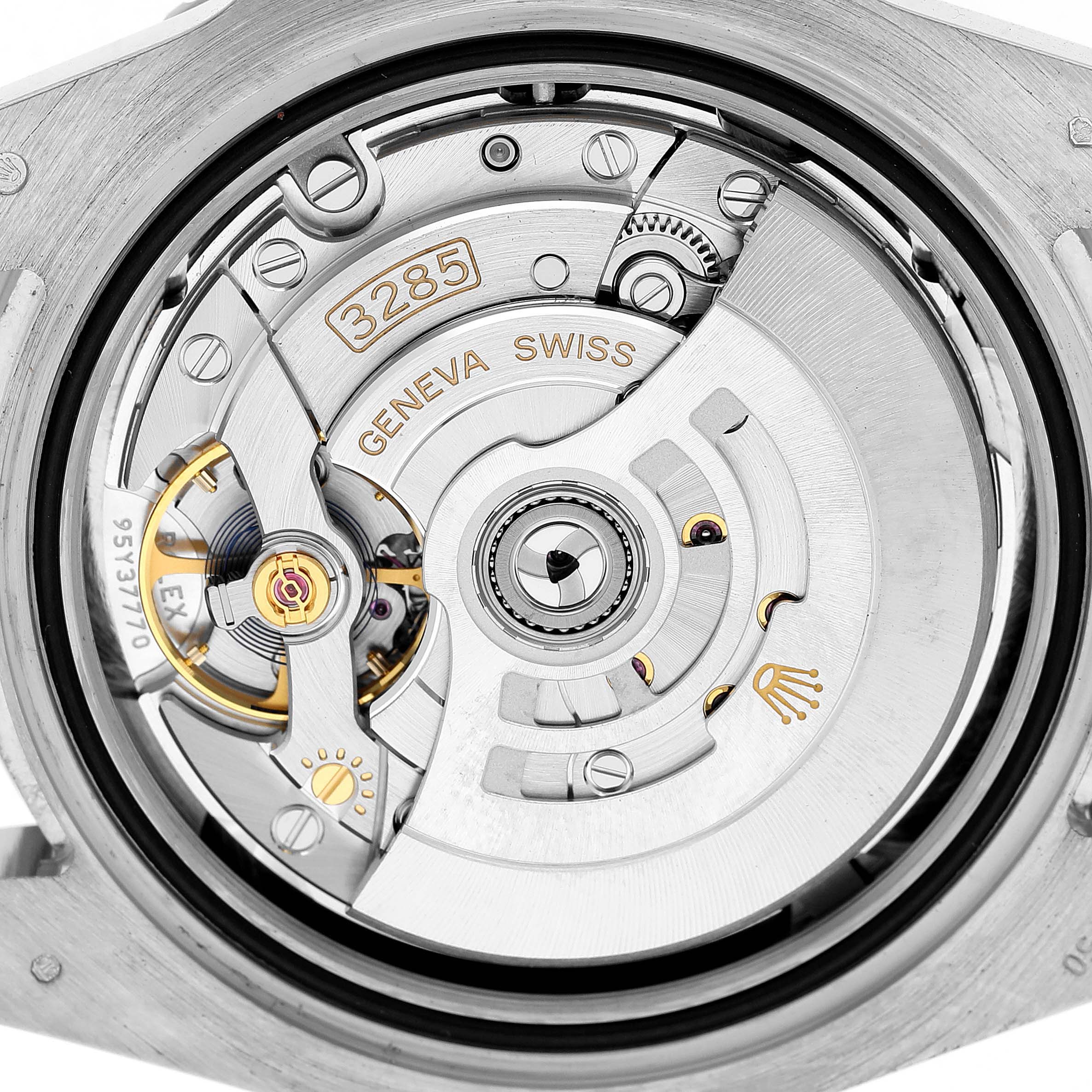 The image shows the movement of a Rolex GMT-Master 126719BLRO Men's White Gold Silver Dial watch, highlighting the intricate internal components of the caliber 3285.