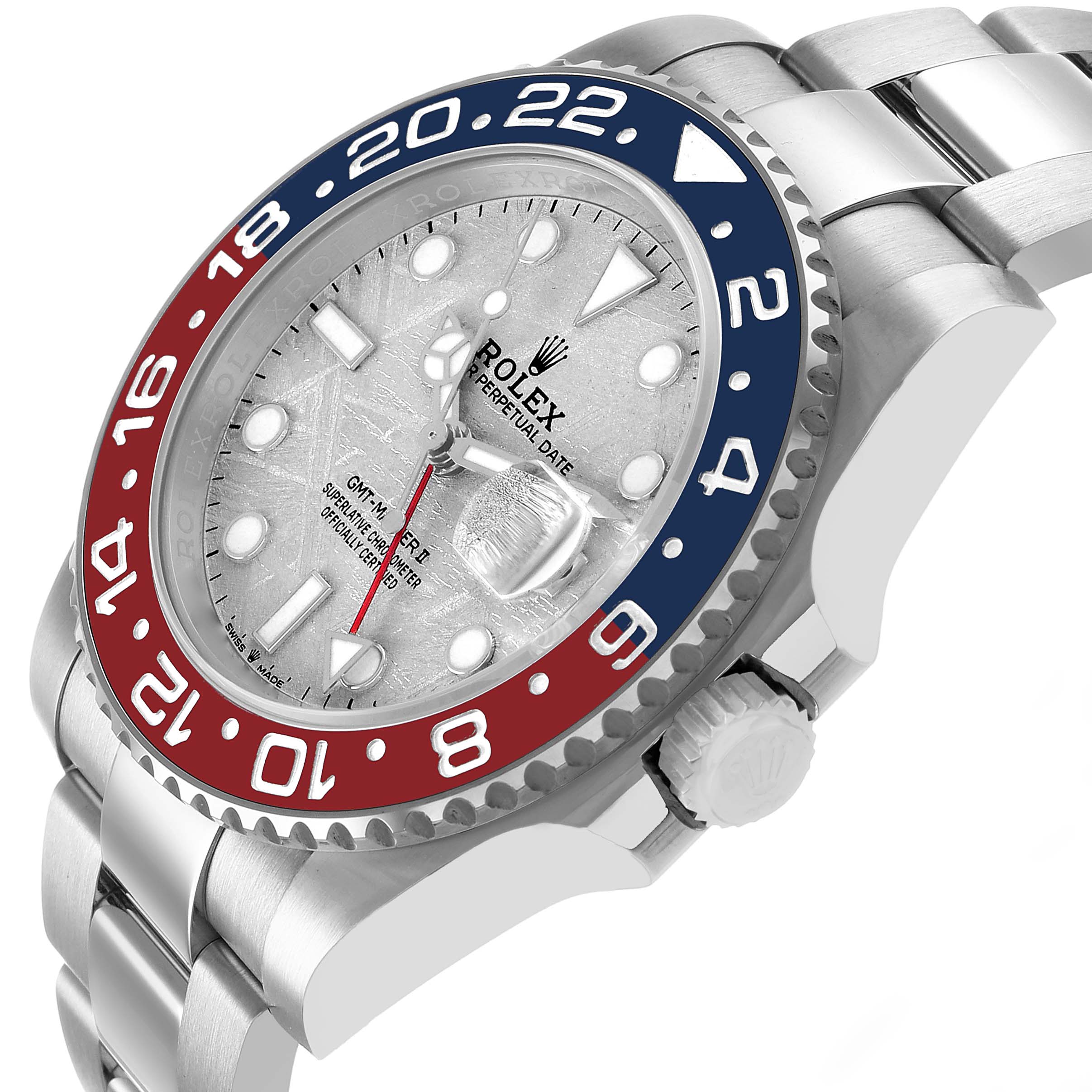 The Rolex GMT-Master 126719BLRO Men's White Gold Silver Dial watch is shown at a diagonal angle, highlighting the bezel, dial, crown, and part of the bracelet.