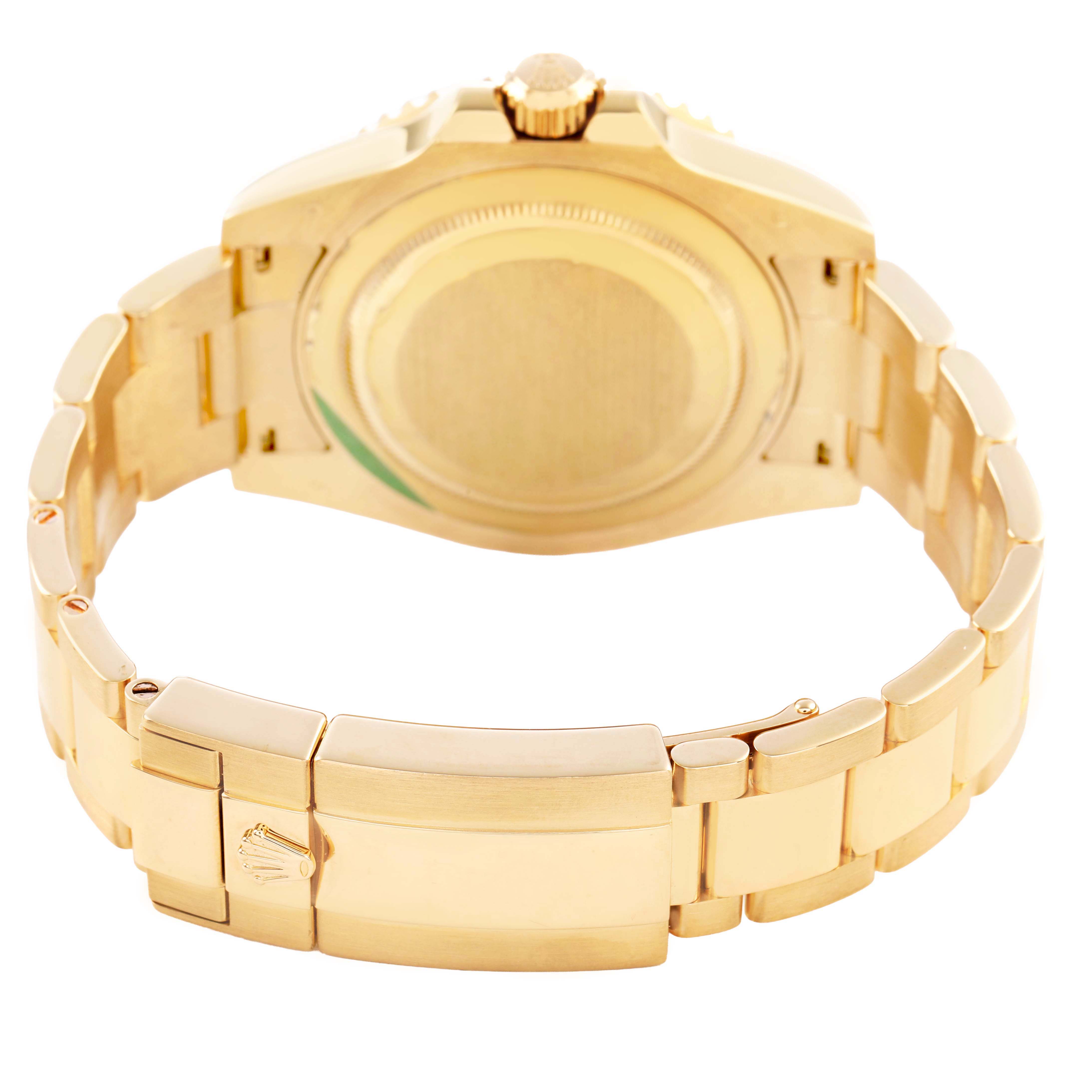 The Rolex GMT-Master 116718 Mens Yellow Gold Green Dial is shown from the back, displaying the case back, bracelet, and clasp.