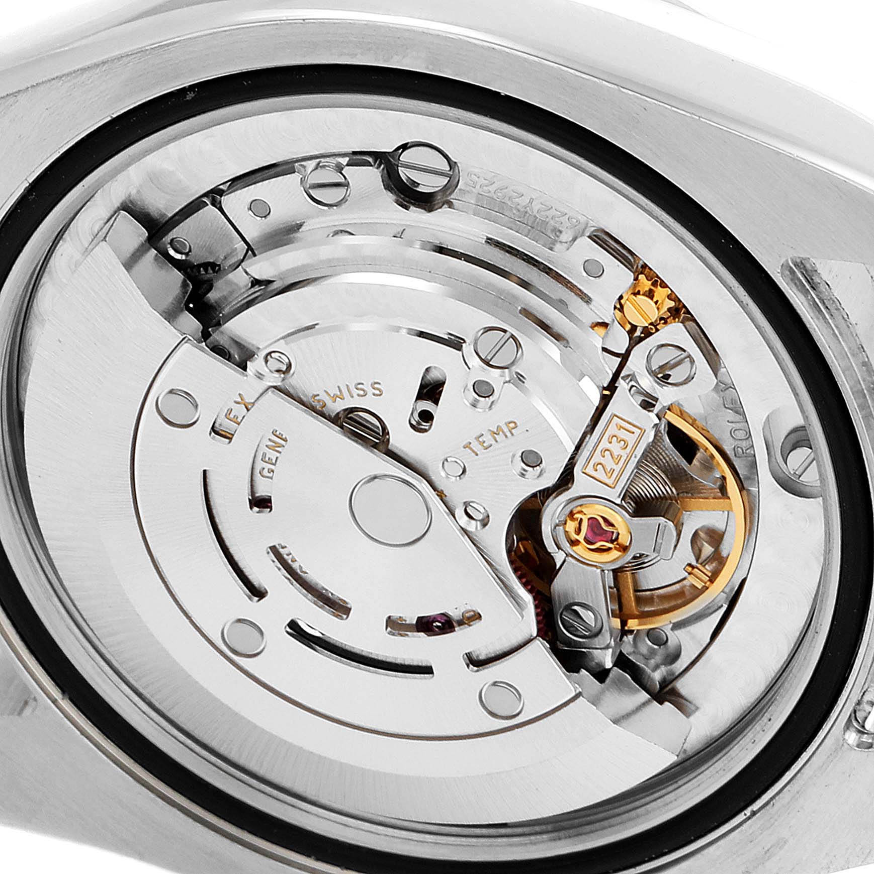 The image shows the internal movement mechanism of a Mid-Size Rolex watch, viewed from the case back.
