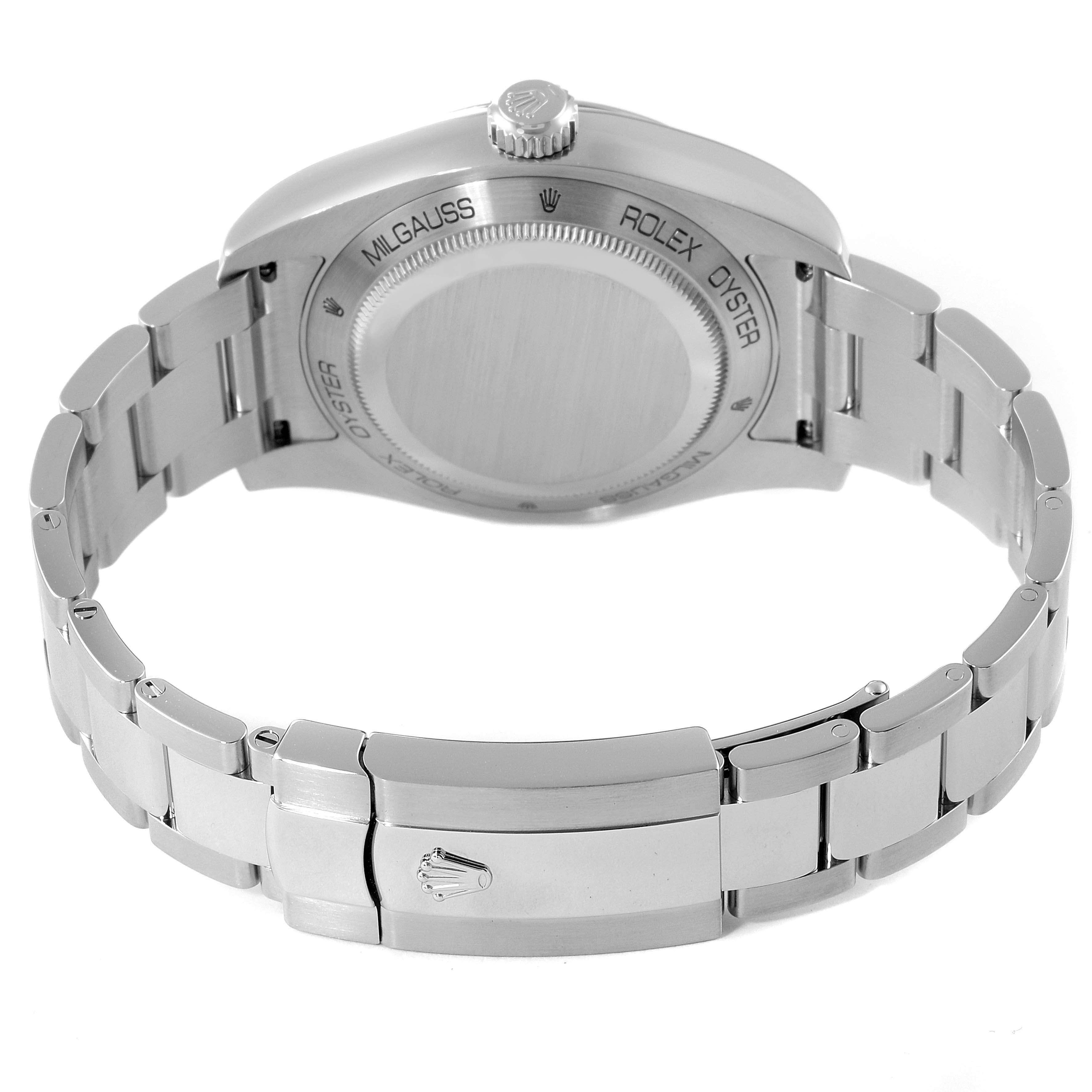 The image shows the backside and clasp of a Rolex Milgauss 116400GV Men's Stainless Steel Black Dial 116400GV Men's Stainless Steel Black Dial watch, highlighting its case back and bracelet.