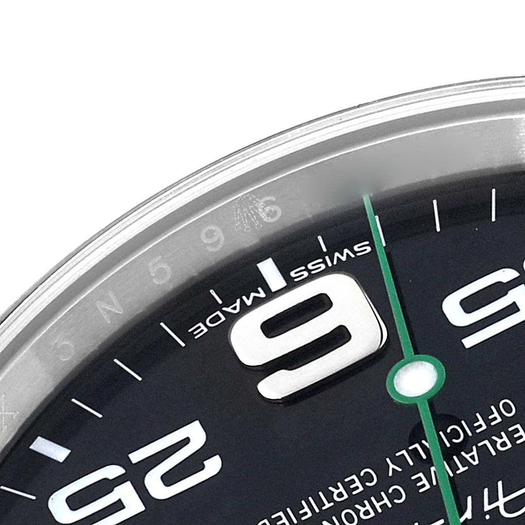This close-up angle shows the face and bezel of a Rolex Air-King 116900 Men's Stainless Steel Black Dial 116900 Men's Stainless Steel Black Dial watch, focusing on the "9" numeral, "Swiss Made" text, and part of the second hand.
