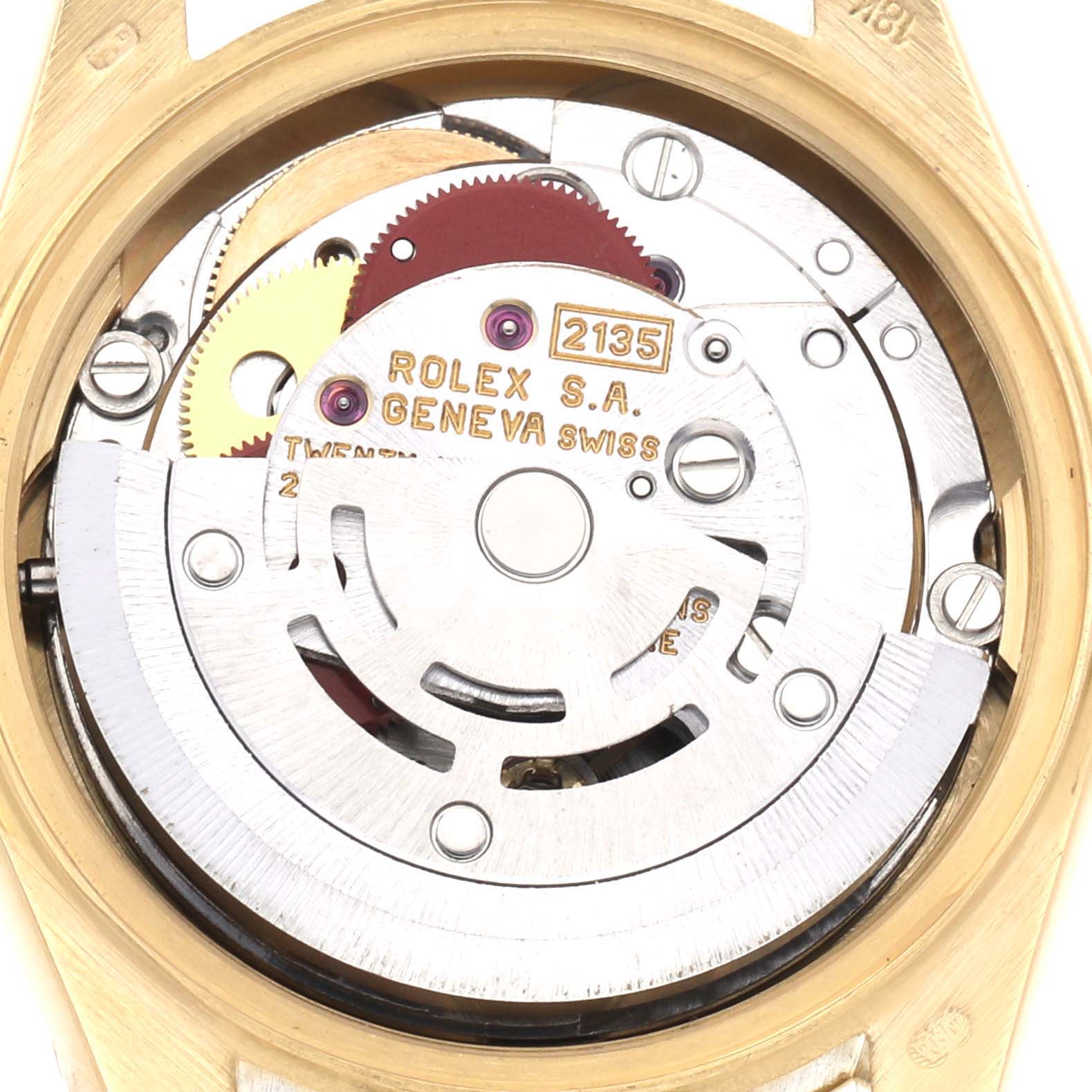 The image shows the internal mechanism of a Rolex President 69178 Women
s Yellow Gold Champagne Dial 69178 Women
s Yellow Gold Champagne Dial model from a top view, highlighting gears and the rotor.
