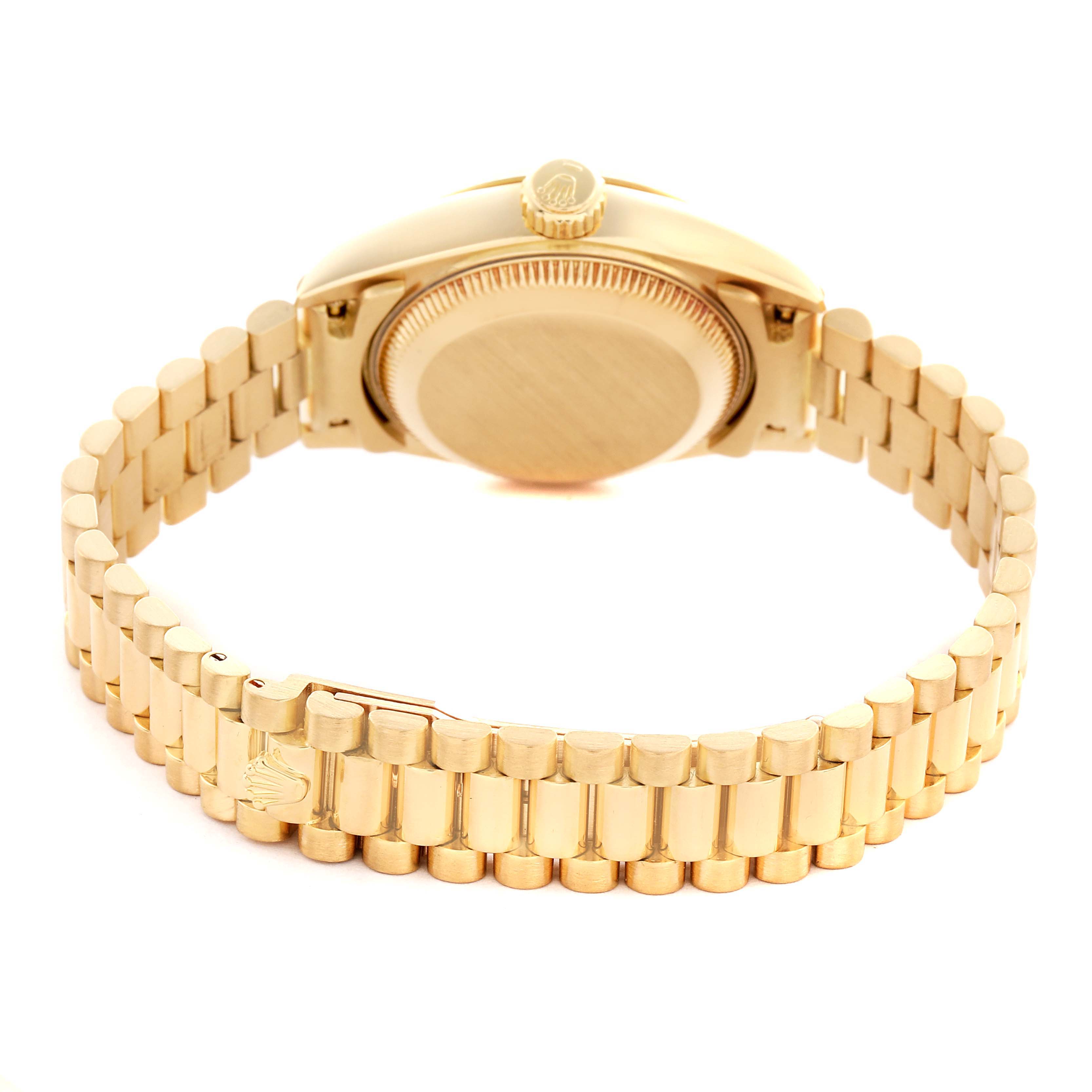 The Rolex President 69178 Women
s Yellow Gold Champagne Dial 69178 Women
s Yellow Gold Champagne Dial model watch is shown from a rear angle displaying the bracelet, clasp, case back, and crown.