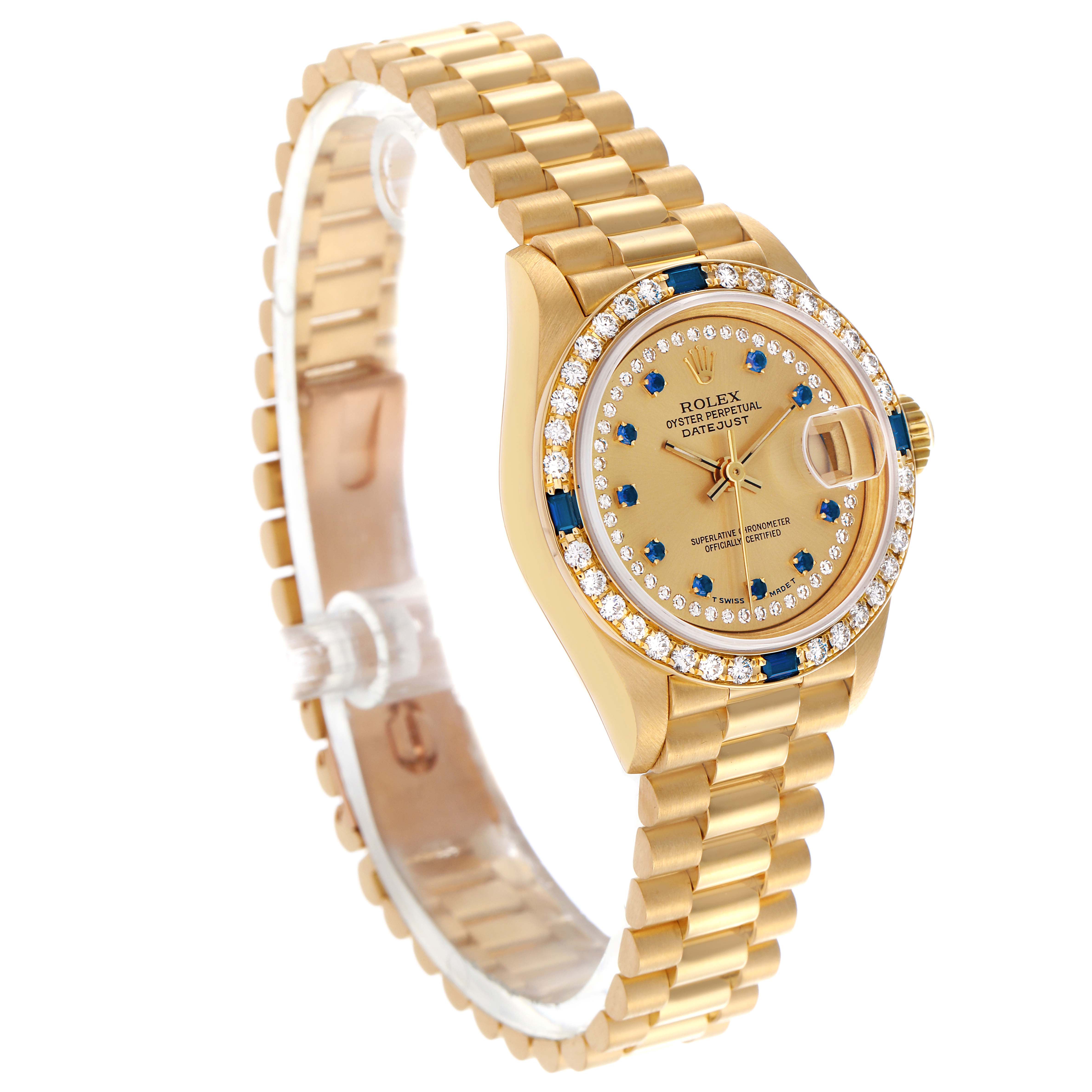 The image shows a Rolex President 69088 Women
s Yellow Gold Champagne Dial 69088 Women
s Yellow Gold Champagne Dial model watch at a three-quarter angle, highlighting its gold bracelet and diamond-encrusted bezel.