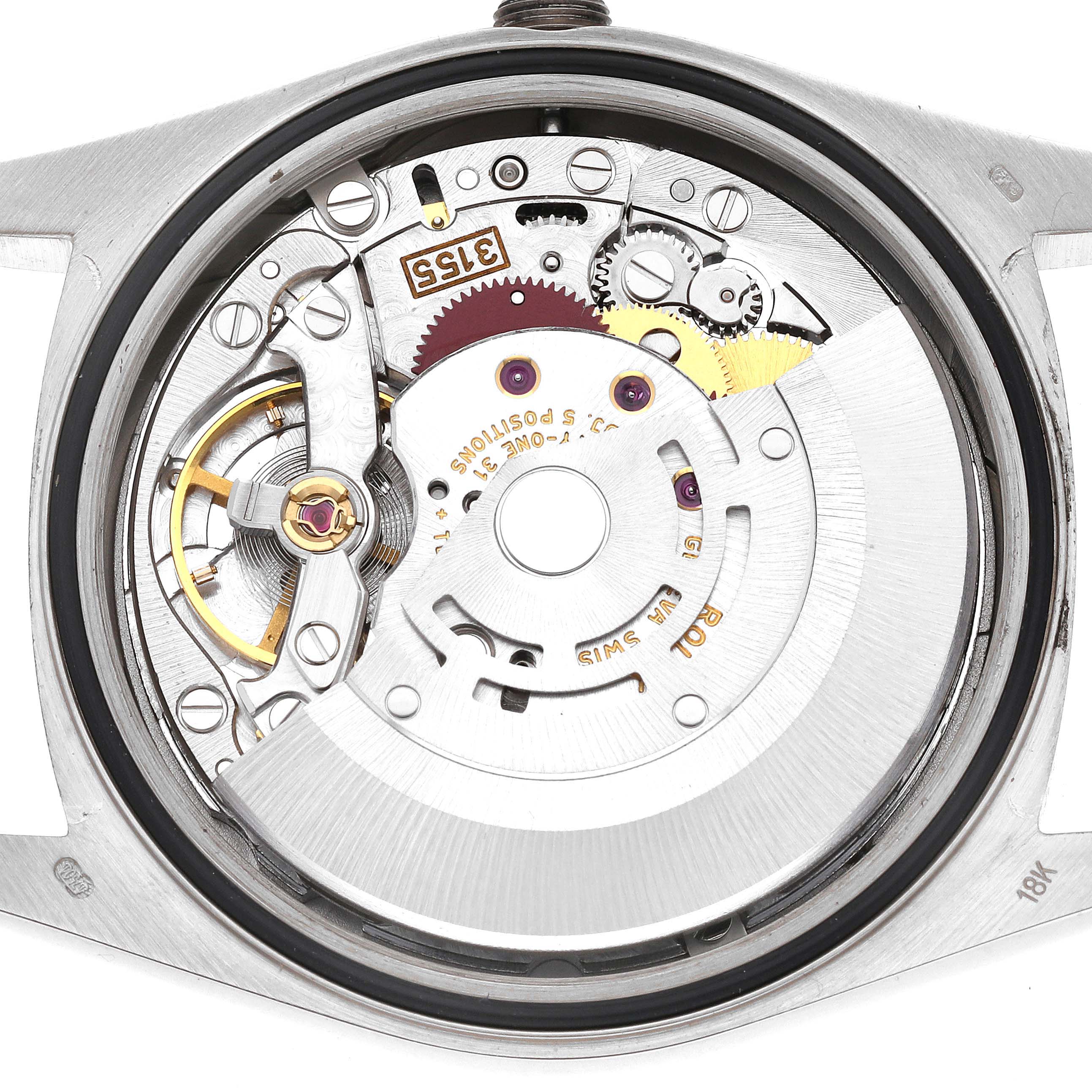 This image shows the internal mechanical movement of a Rolex President 18239A Men
s White Gold Blue Dial 18239A Men
s White Gold Blue Dial model watch from a rear angle with the case back removed.