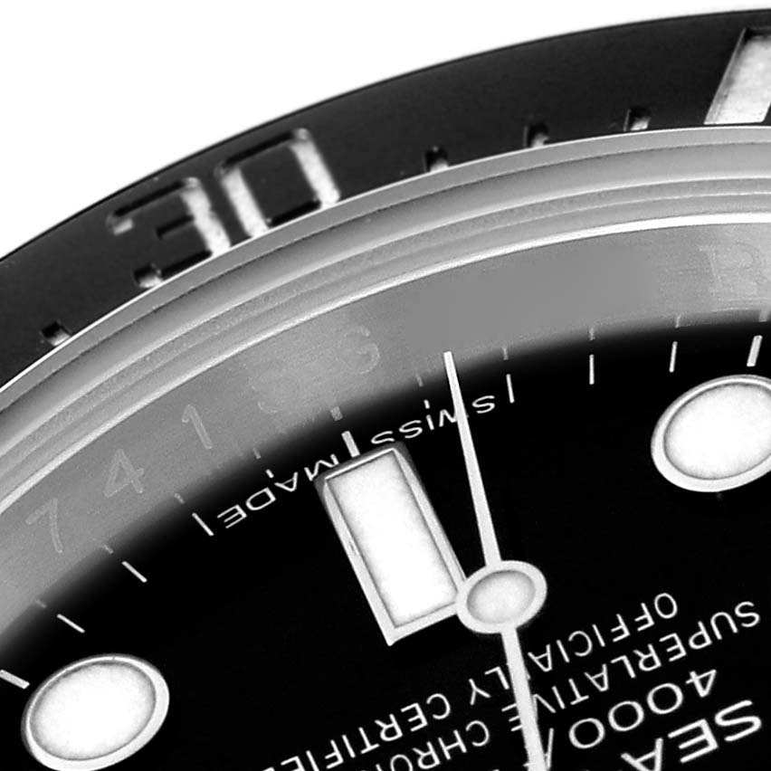 This image shows a close-up of the dial and bezel of a Rolex Sea-Dweller 116600 Men's Stainless Steel Black Dial 116600 Men's Stainless Steel Black Dial watch, highlighting the 30 mark and parts of the minute hand and hour markers.