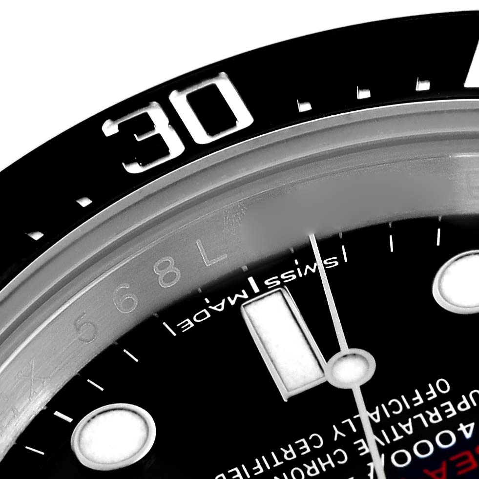 The image shows a close-up of the Rolex Sea-Dweller 126600 Men
s Stainless Steel Black Dial 126600 Men
s Stainless Steel Black Dial
s dial and part of the bezel, highlighting the "30" marking and text details.