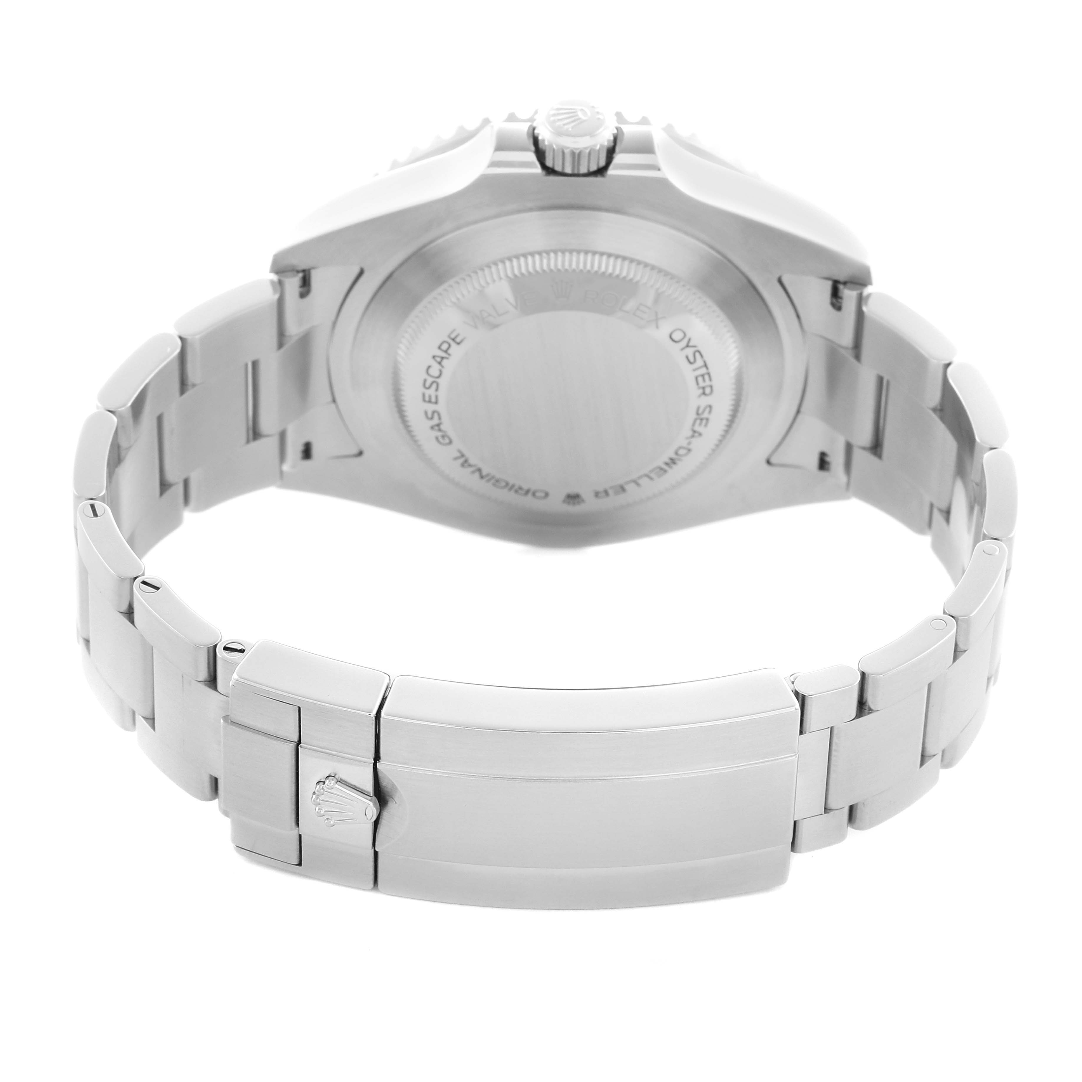 The image shows a Rolex Sea-Dweller 126600 Men
s Stainless Steel Black Dial 126600 Men
s Stainless Steel Black Dial watch from the back, highlighting the case back, bracelet, and clasp.