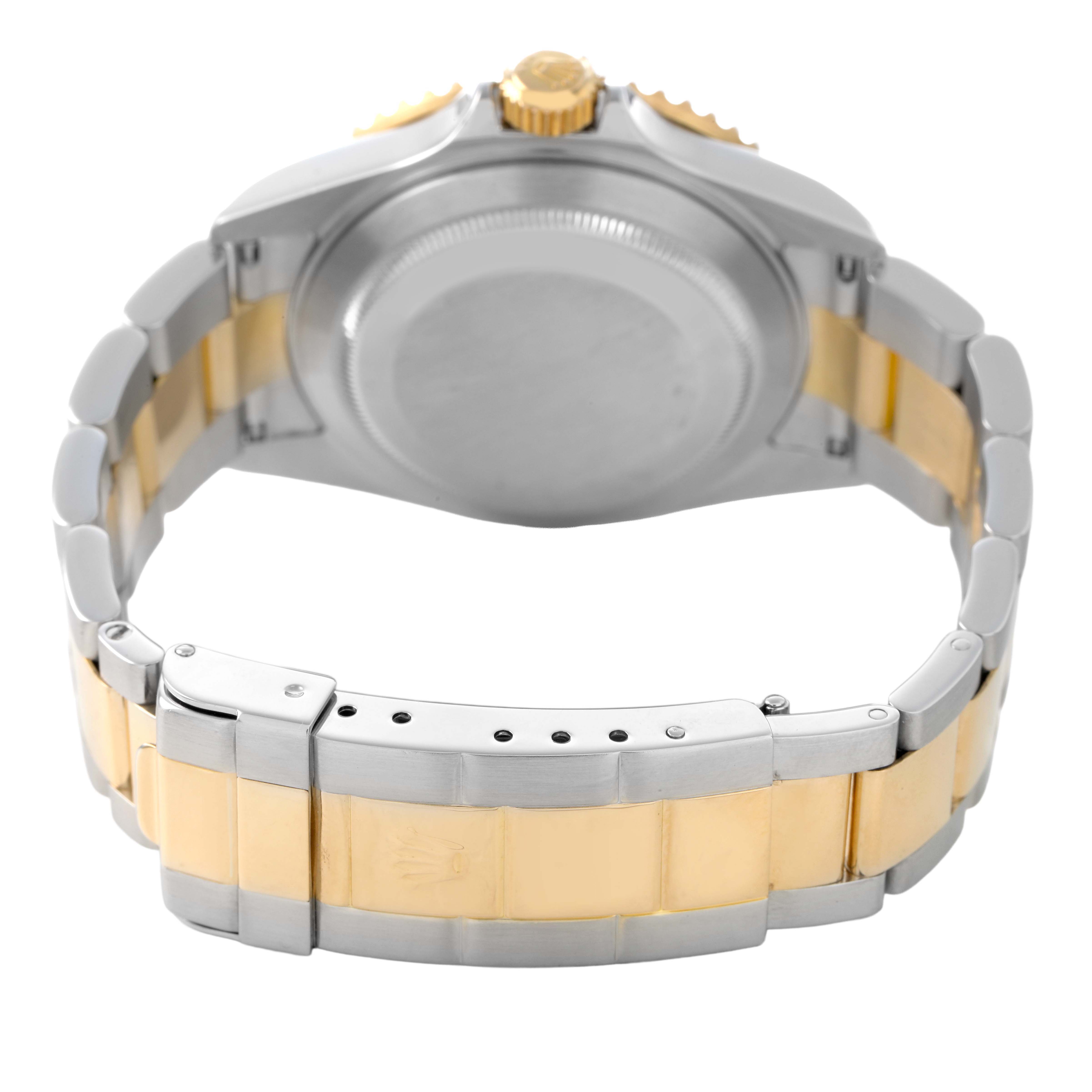 The image shows the back view of a Rolex Submariner 16613 Men's Steel and Gold (two tone) Champagne Dial, focusing on the bracelet and clasp in silver and gold tones.