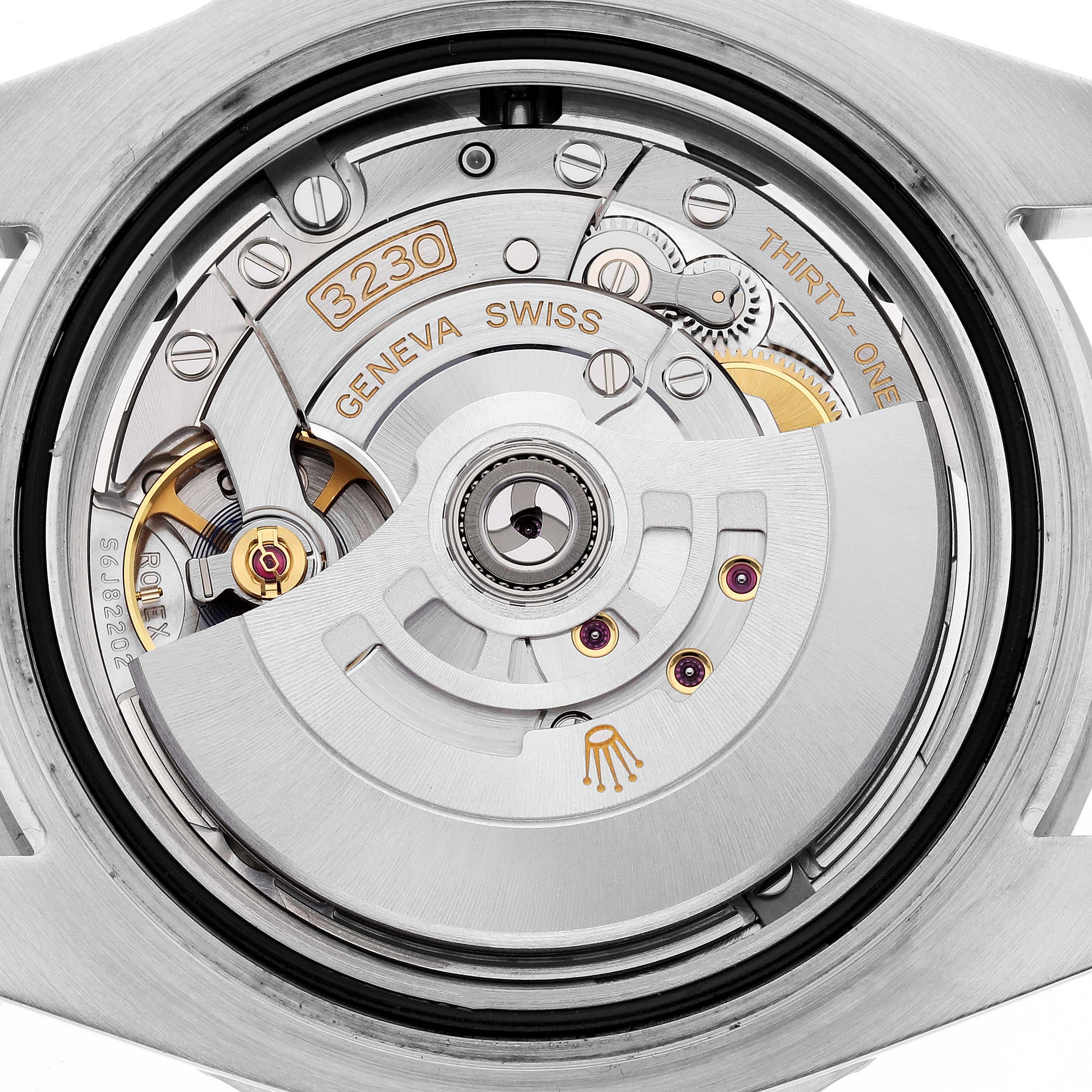 This image shows the movement and inner mechanism of a Rolex Submariner 124060 Men's Stainless Steel Black Dial 124060 Men's Stainless Steel Black Dial watch from a back angle.