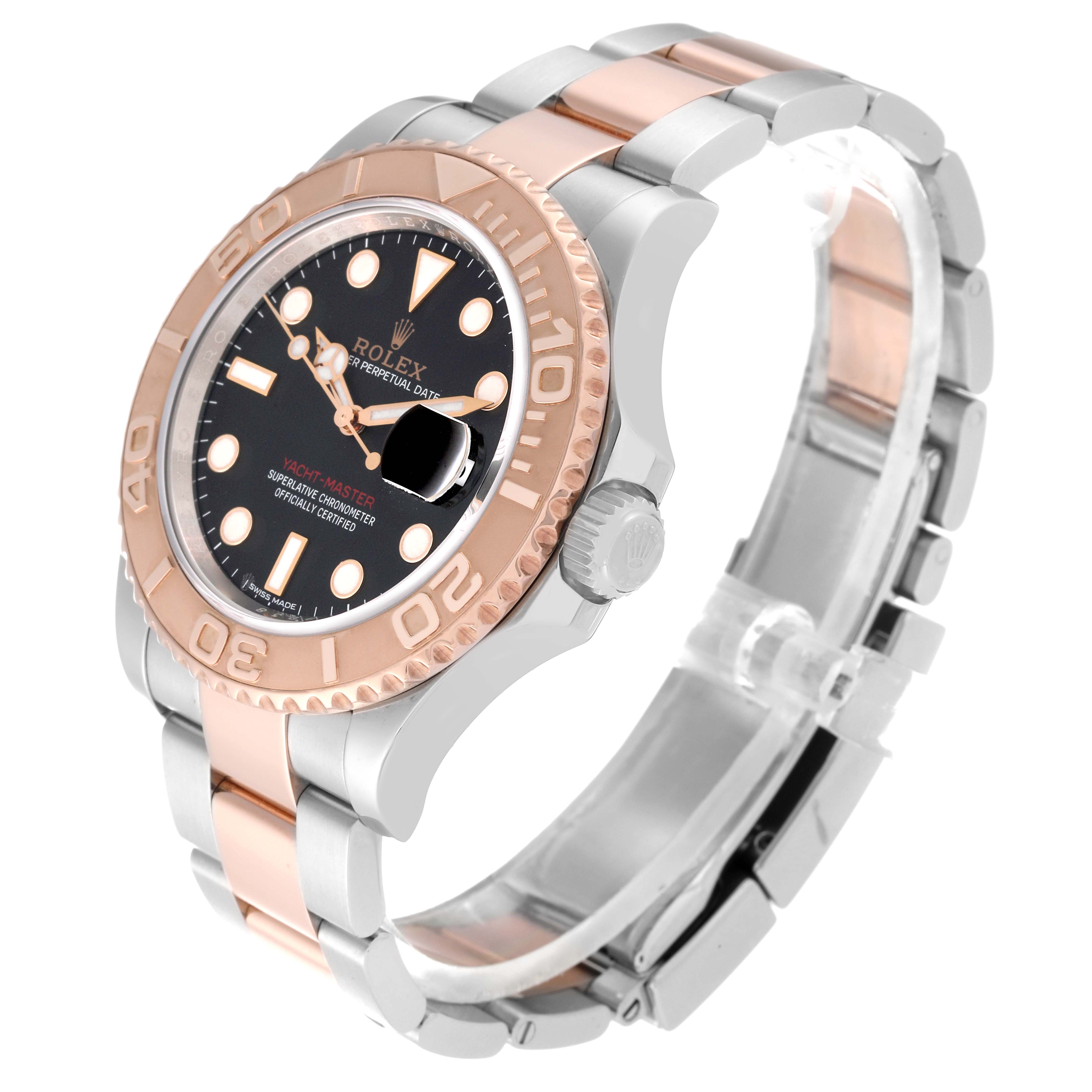 The Rolex Yacht-Master 116621 Men's Steel and Gold (two tone) Black Dial 116621 Men's Steel and Gold (two tone) Black Dial watch is at a slight angle showing its rose gold bezel, crown, black dial, and two-tone bracelet.
