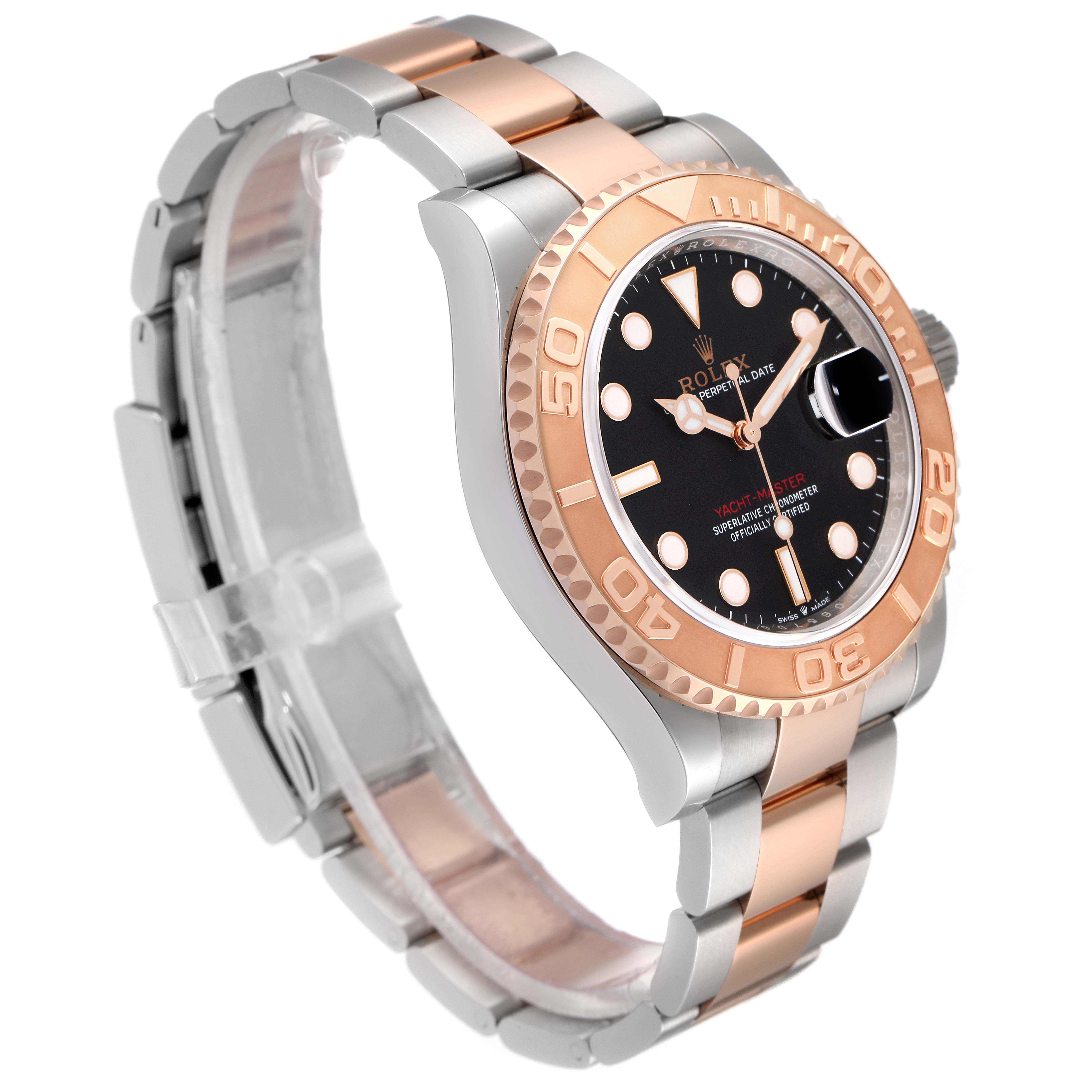 The Rolex Yacht-Master 126621 Men's Steel and Gold (two tone) Black Dial 126621 Men's Steel and Gold (two tone) Black Dial watch is shown at an angle displaying part of the band, case, bezel, dial, and crown.