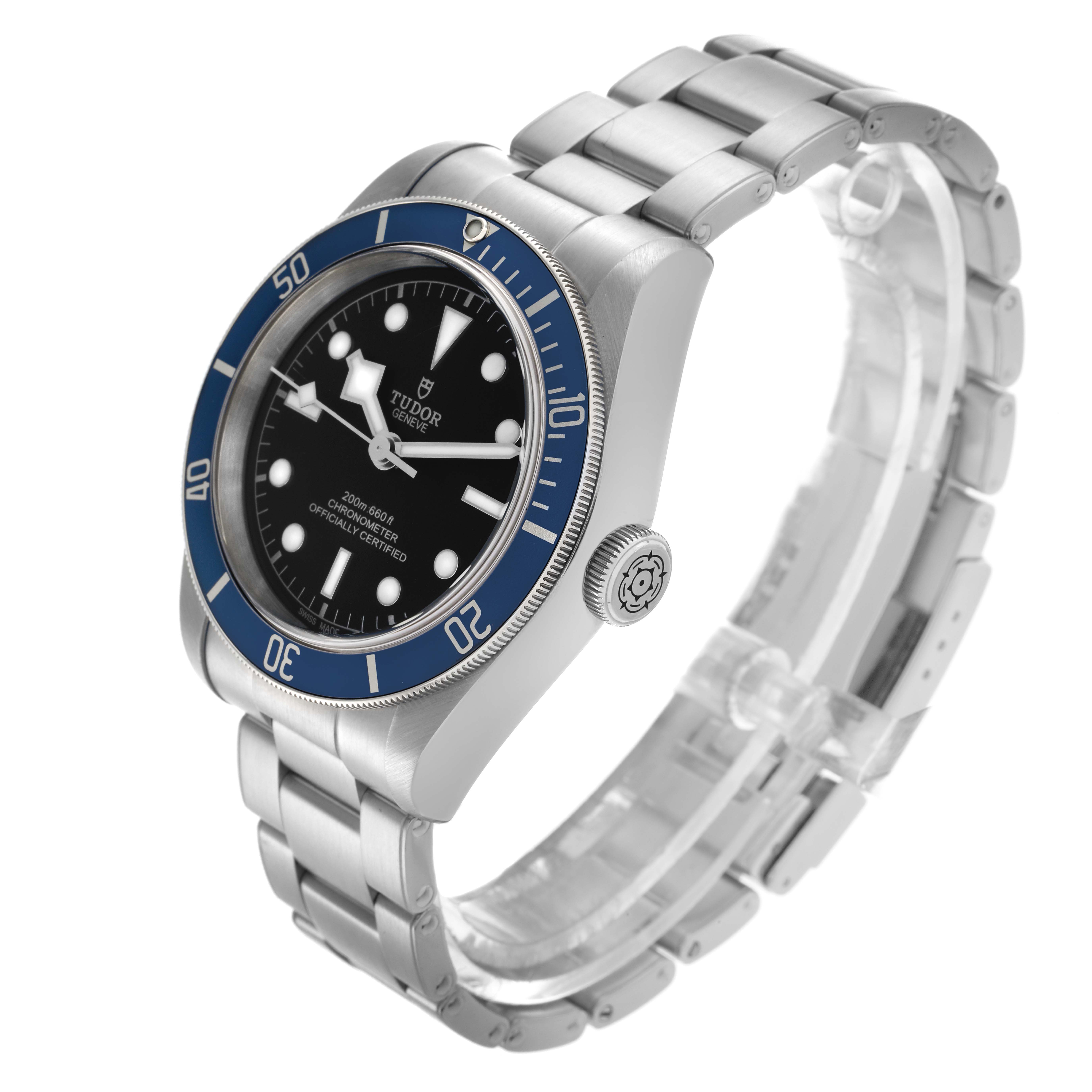 The Tudor Heritage Black Bay 79230B Men
s Stainless Steel Black Dial 79230B Men
s Stainless Steel Black Dial watch is shown at a three-quarter angle highlighting the face, bezel, crown, and bracelet.