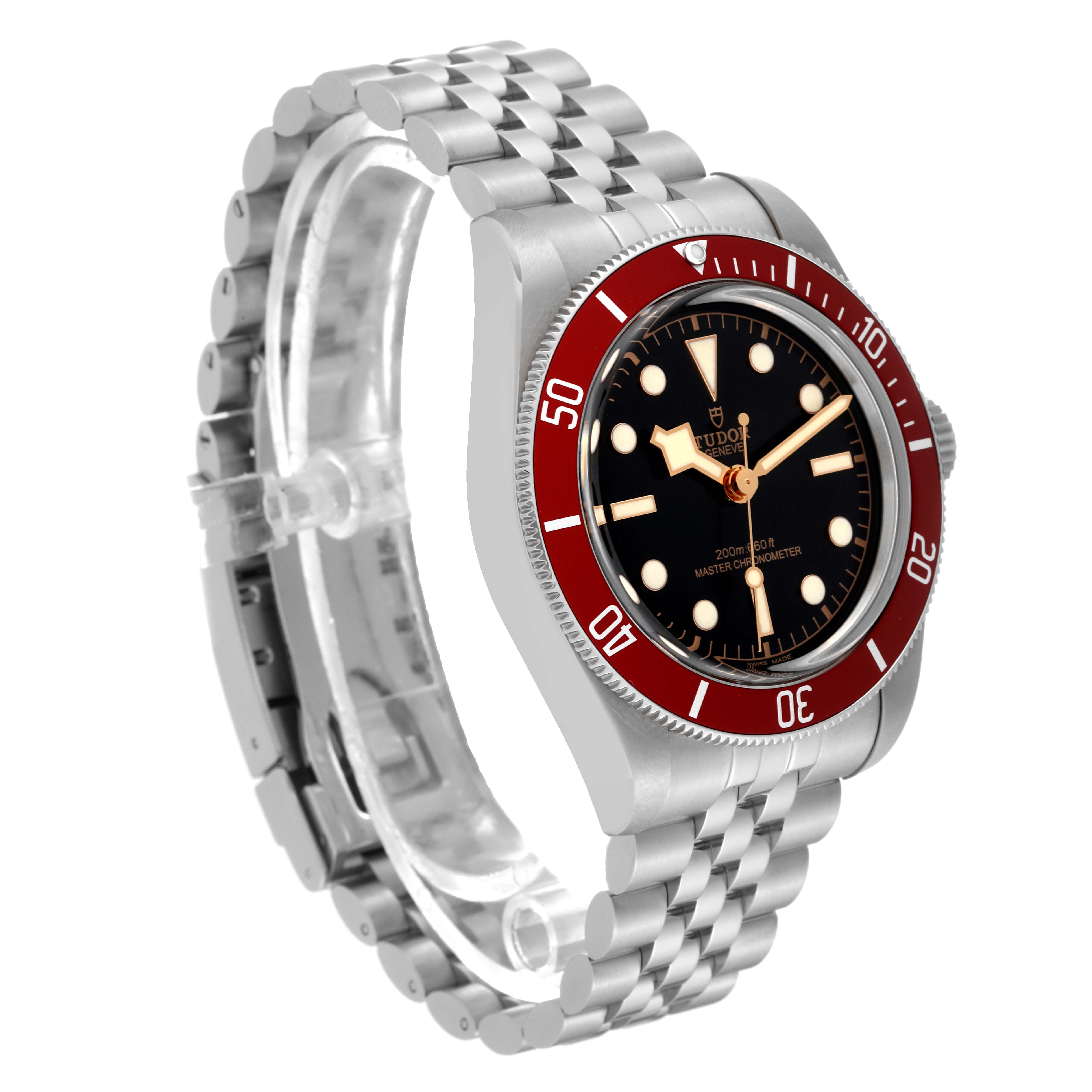 The image shows a Tudor Heritage Black Bay 7941A1A0RU Men
s Stainless Steel Black Dial 7941A1A0RU Men
s Stainless Steel Black Dial watch at a three-quarter angle, highlighting its red bezel, black dial, and stainless steel bracelet.