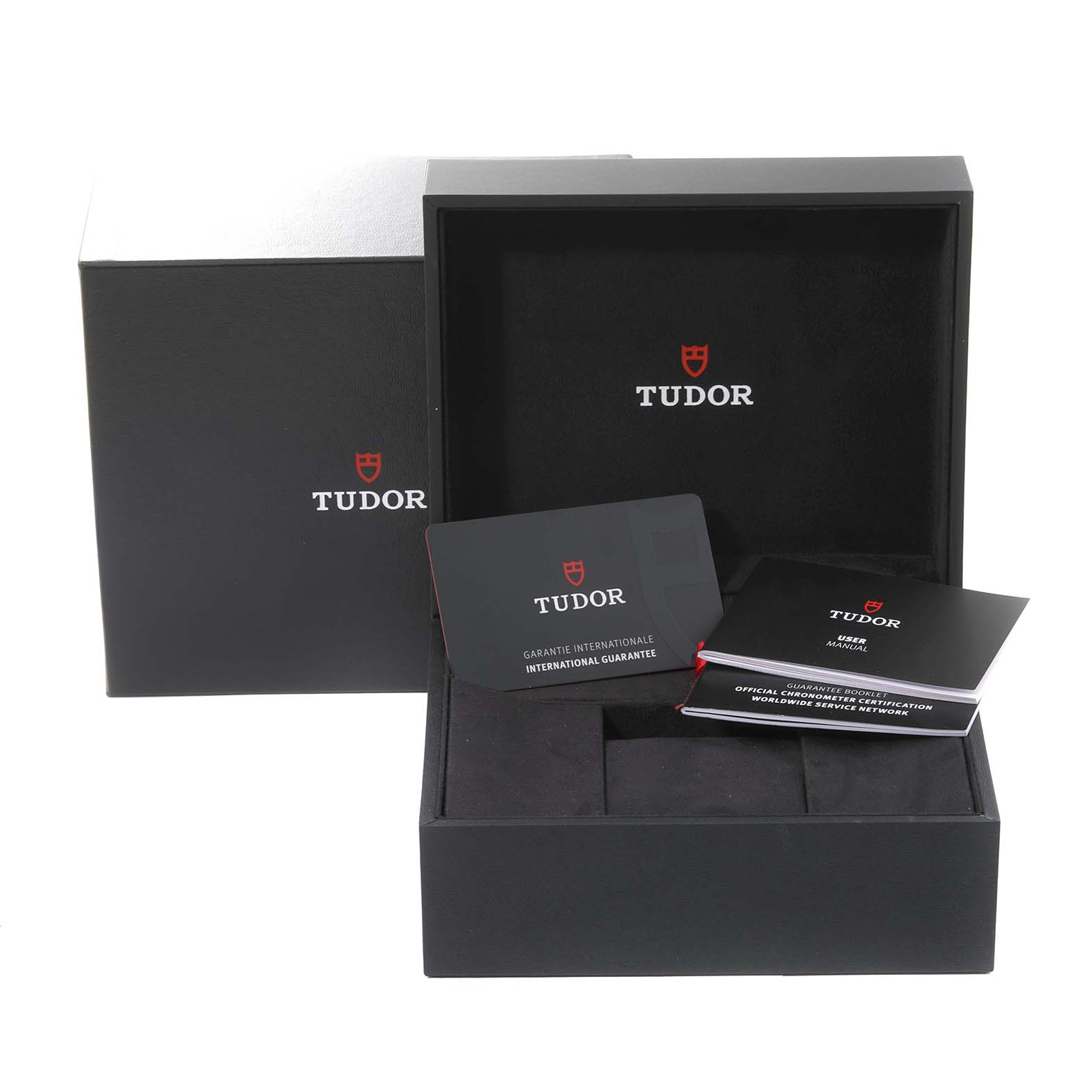 The image shows the packaging, international guarantee card, and user manual for the Tudor Heritage Black Bay 7941A1A0RU Men
s Stainless Steel Black Dial 7941A1A0RU Men
s Stainless Steel Black Dial watch model.