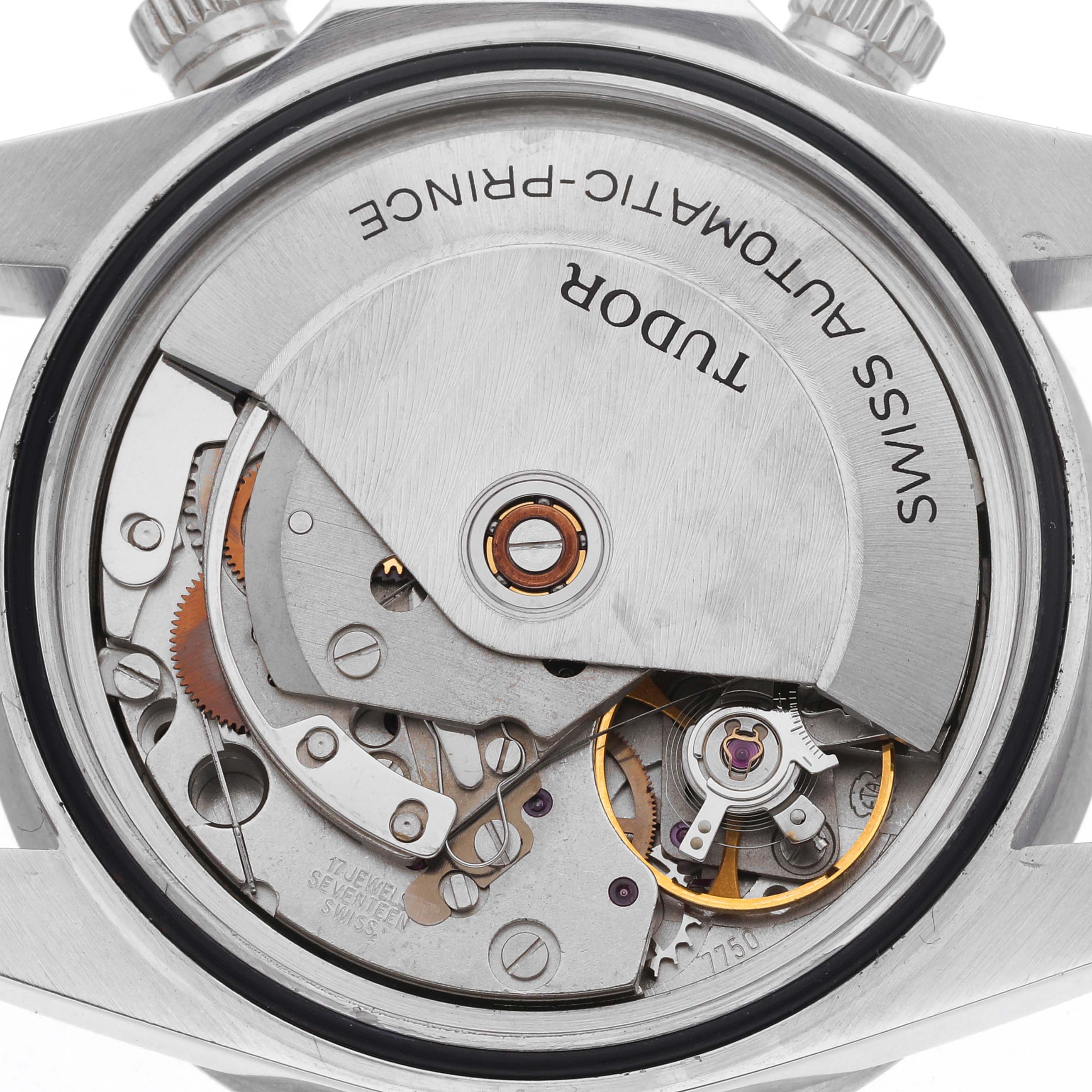 The image shows the movement of a Tudor Prince 79180 Men
s Stainless Steel Black Dial 79180 Men
s Stainless Steel Black Dial watch from the rear, highlighting the rotor and inner mechanical components.