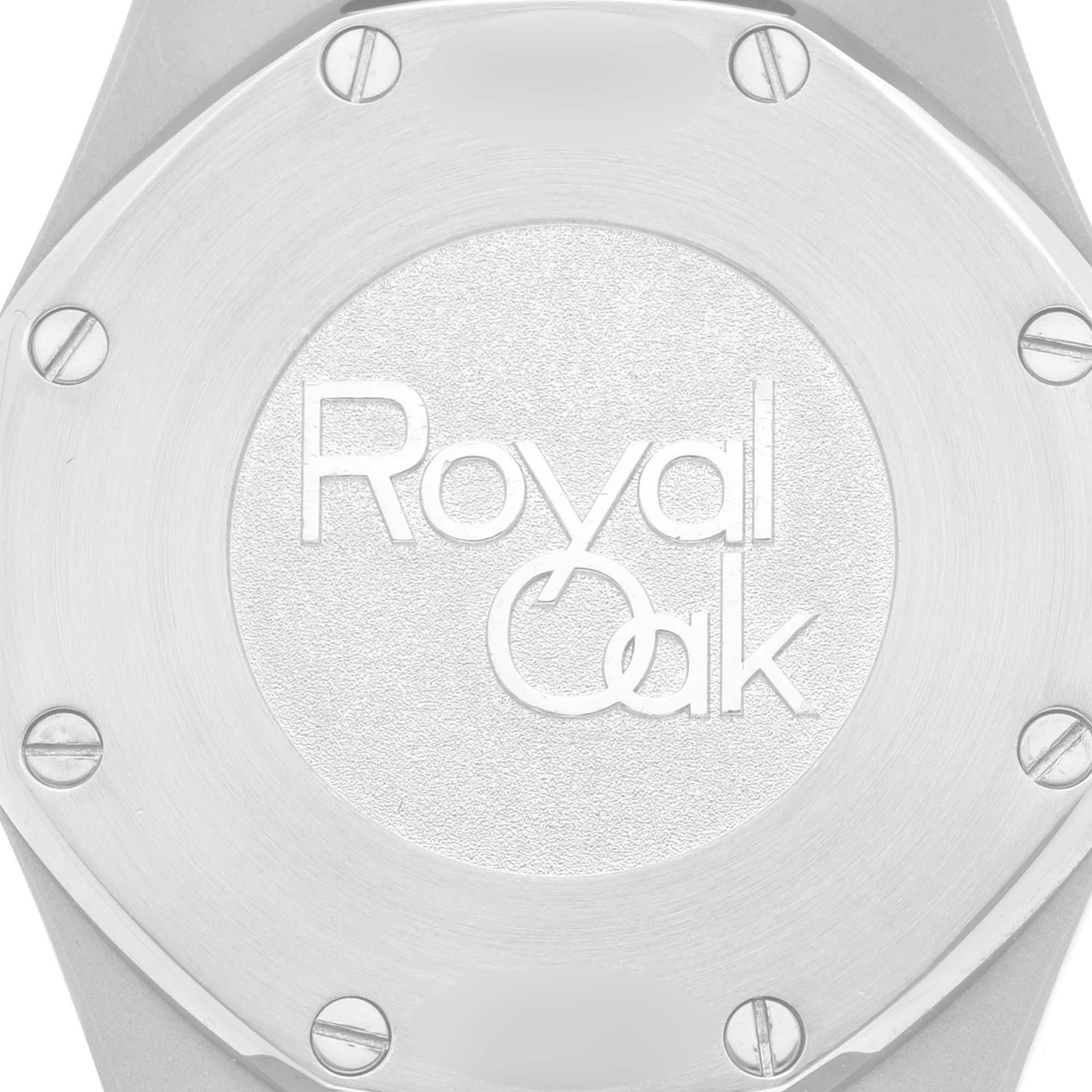 The image shows a close-up of the case back of an Audemars Piguet Royal Oak 67651SR.ZZ.1261SR.01 Women
s Steel and Gold (two tone) Silver Dial 67651SR.ZZ.1261SR.01 Women
s Steel and Gold (two tone) Silver Dial watch.