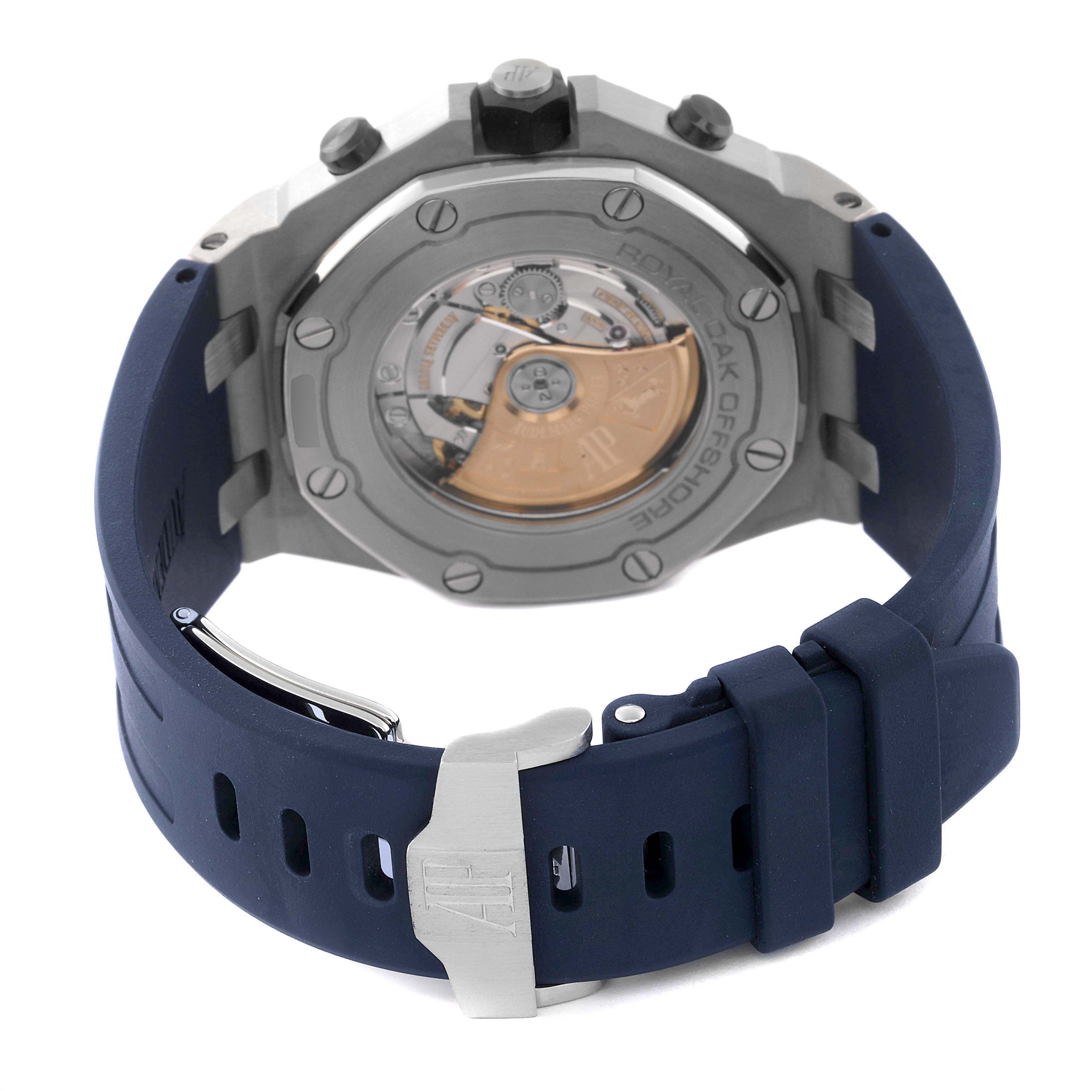 The image shows the back view of an Audemars Piguet Royal Oak Offshore 26470ST.OO.A027CA.01 Men's Stainless Steel Blue Dial 26470ST.OO.A027CA.01 Men's Stainless Steel Blue Dial watch, highlighting its transparent case back and navy strap.