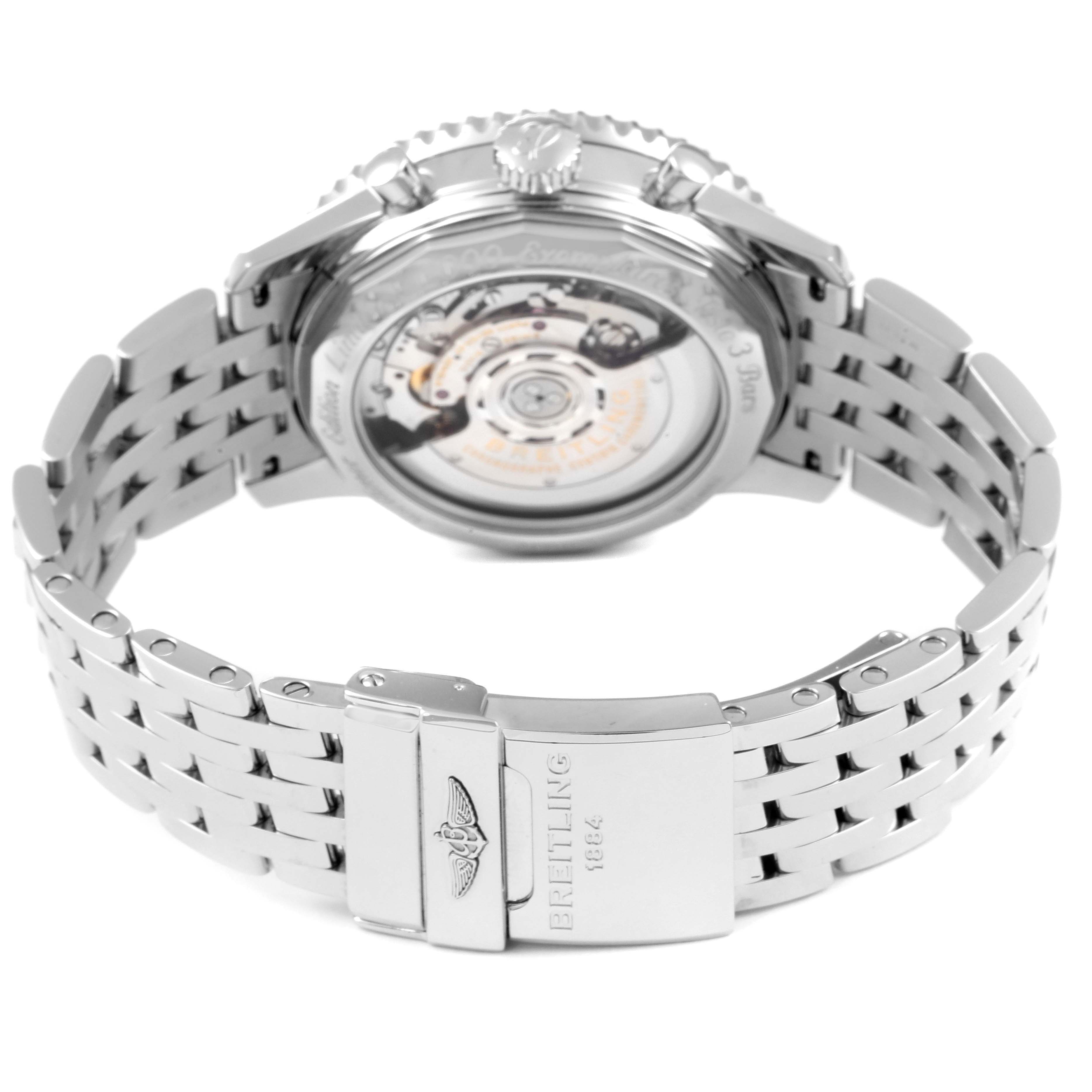 The image shows the back view of a Breitling Navitimer AB0123 Men's Stainless Steel Silver Dial AB0123 Men's Stainless Steel Silver Dial watch, highlighting its stainless steel bracelet and transparent case back.