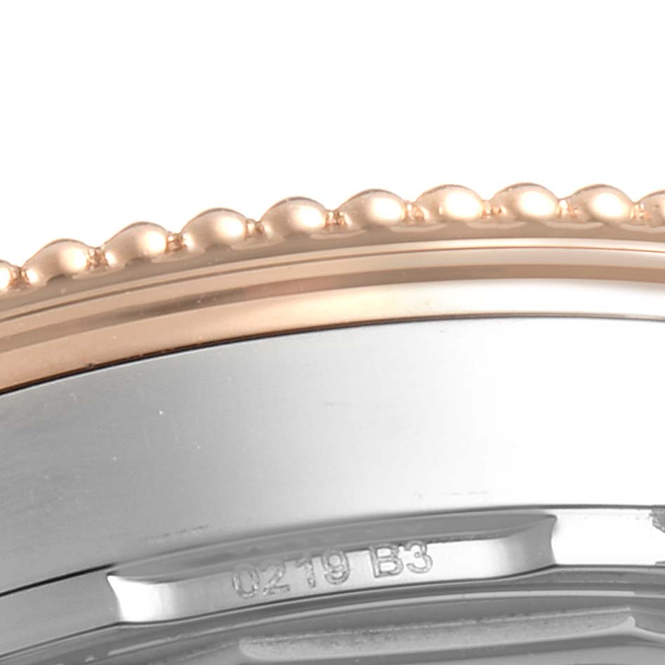 This close-up image shows the bezel and case of a Breitling Navitimer U17325211G1A1 Men
s Stainless Steel Silver Dial U17325211G1A1 Men
s Stainless Steel Silver Dial watch.