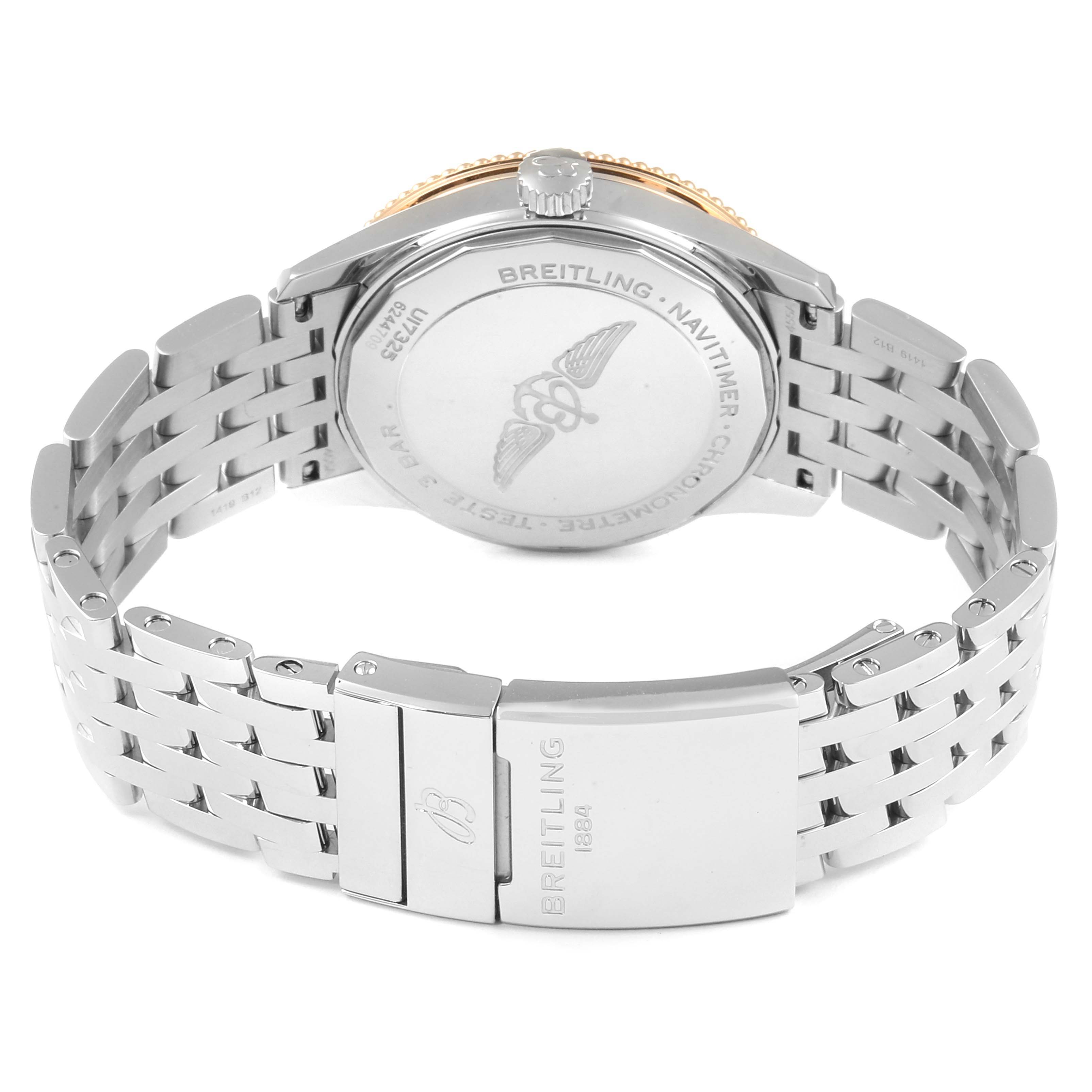 The image shows the back view of a Breitling Navitimer U17325211G1A1 Men
s Stainless Steel Silver Dial U17325211G1A1 Men
s Stainless Steel Silver Dial watch, including the case back, crown, and stainless steel bracelet with a clasp.