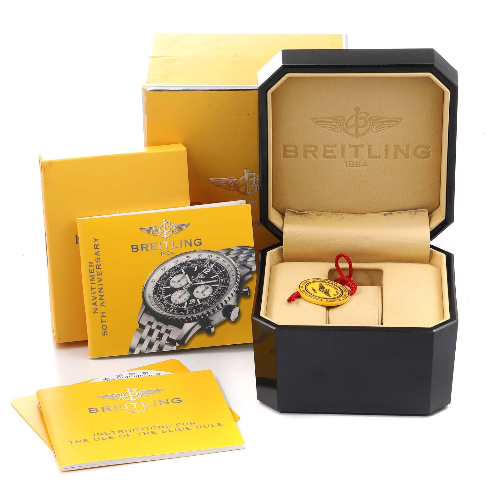 The image shows the Breitling Navitimer A41322 Men
s Stainless Steel Black Dial A41322 Men
s Stainless Steel Black Dial watch box and accessories, including manuals and warranty card.