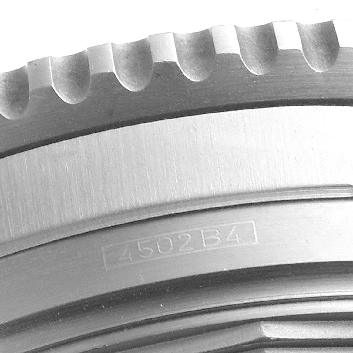 This is a close-up view of the bezel and side case of a Breitling Navitimer A41322 Men
s Stainless Steel Black Dial A41322 Men
s Stainless Steel Black Dial watch.