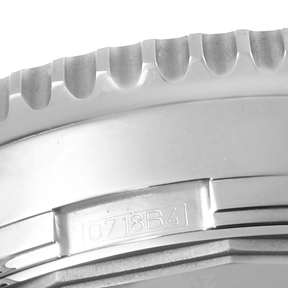 Close-up angle showing the bezel and case of the Breitling Navitimer A24322 Men's Stainless Steel Blue Dial A24322 Men's Stainless Steel Blue Dial watch, highlighting the engraved serial number.