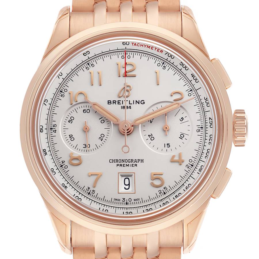 The Breitling Premier model watch is shown from the front, displaying the dial, chronograph subdials, and bezel with a gold bracelet.