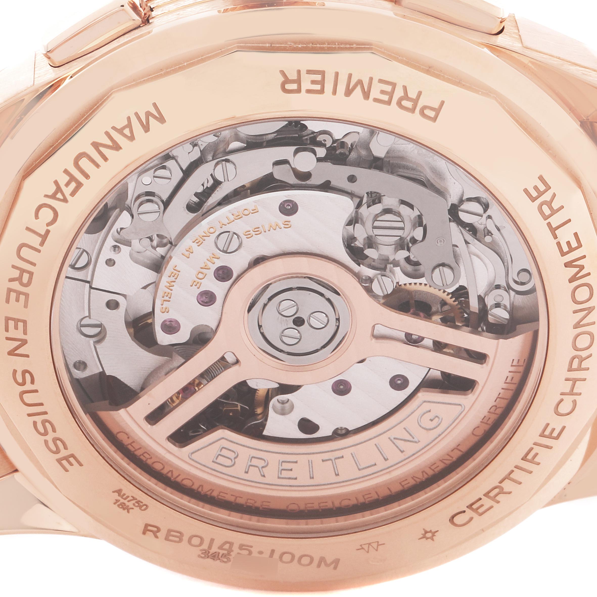 The image shows the back of a Breitling Premier RB0145371G1R1 Men
s Rose Gold White Dial RB0145371G1R1 Men
s Rose Gold White Dial watch, highlighting its mechanical movement through a transparent case back.