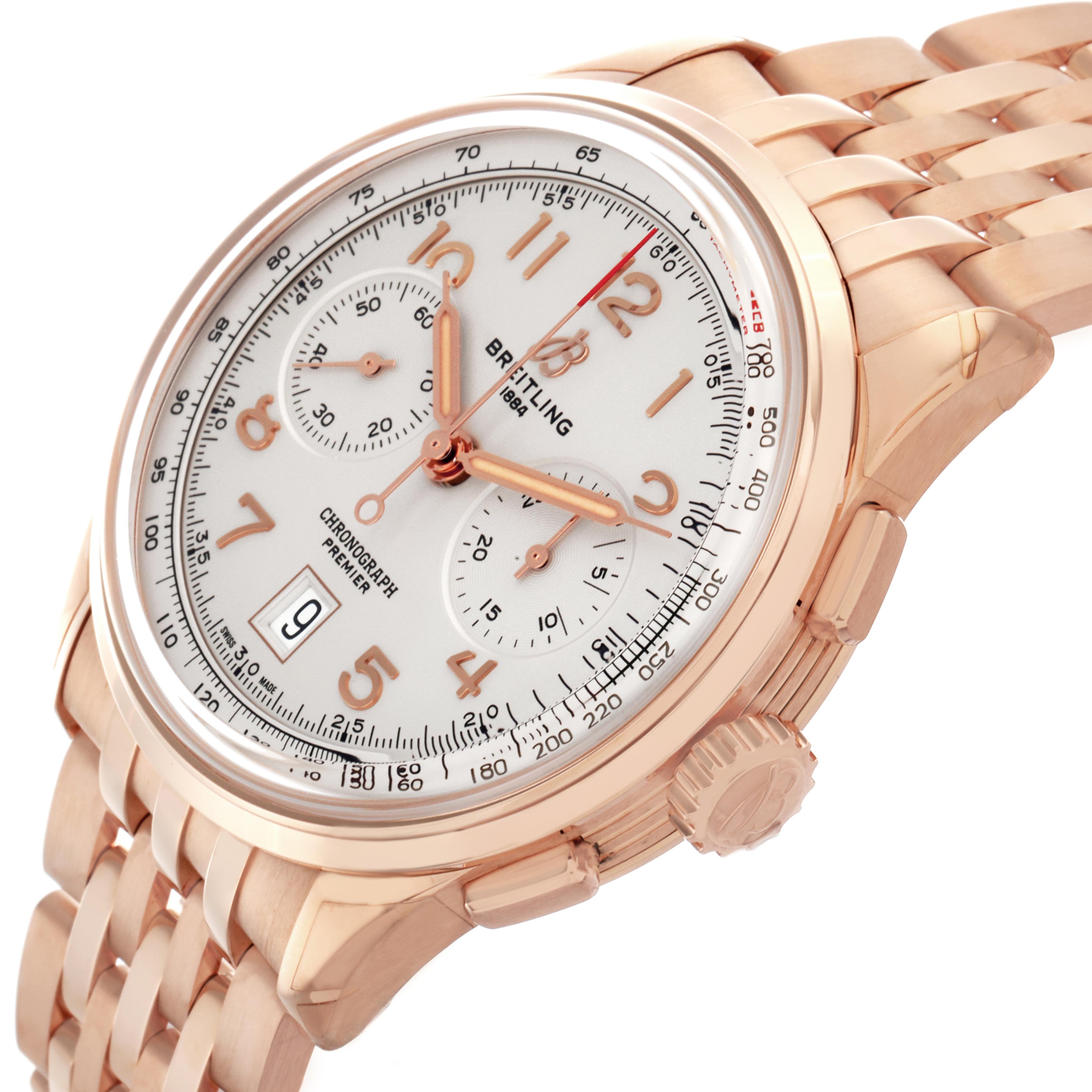 The Breitling Premier RB0145371G1R1 Men
s Rose Gold White Dial RB0145371G1R1 Men
s Rose Gold White Dial model watch is shown at an angled side view, highlighting its face, bezel, crown, and bracelet.