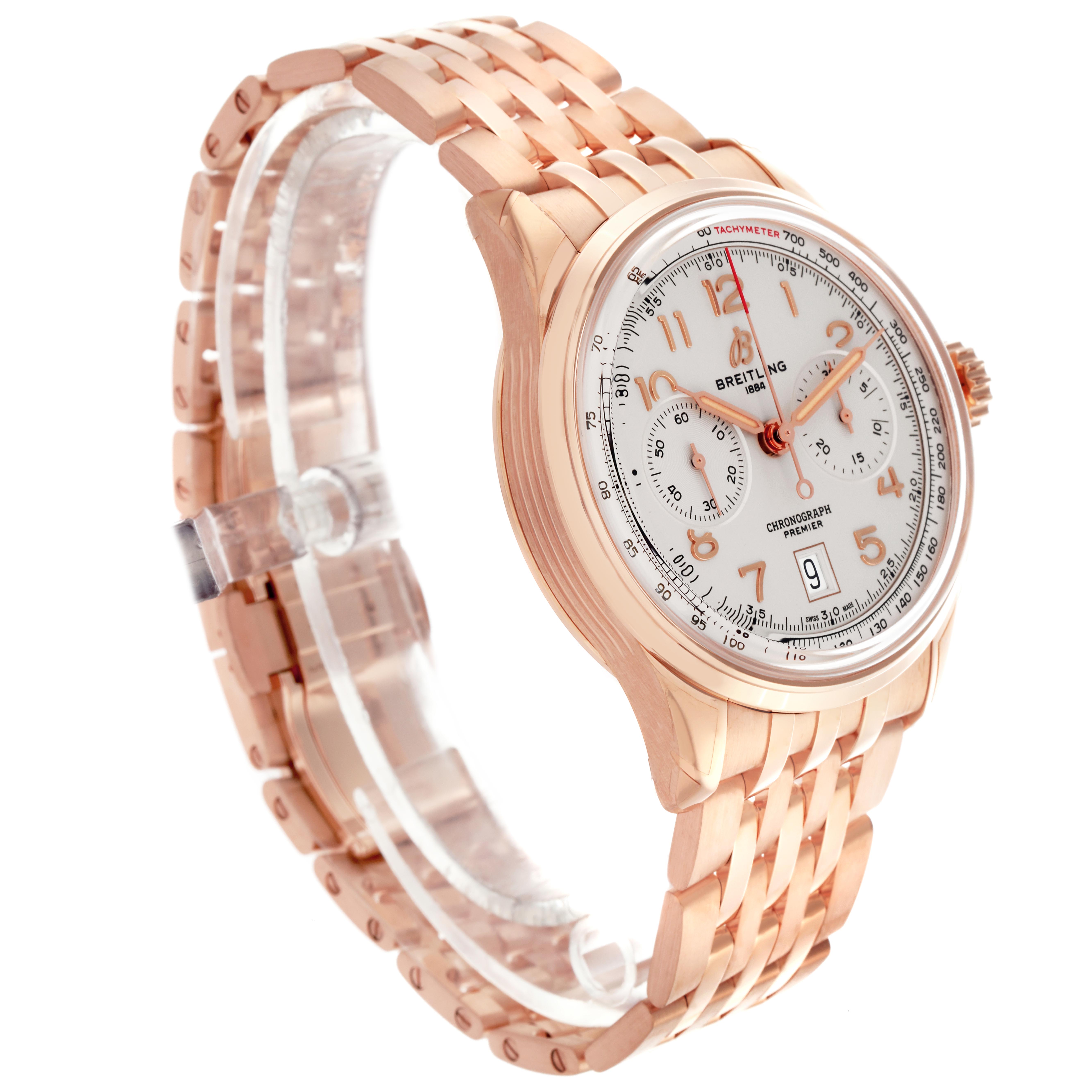 The Breitling Premier RB0145371G1R1 Men
s Rose Gold White Dial RB0145371G1R1 Men
s Rose Gold White Dial watch is shown at an oblique angle, highlighting the dial, chronograph subdials, and metal bracelet.