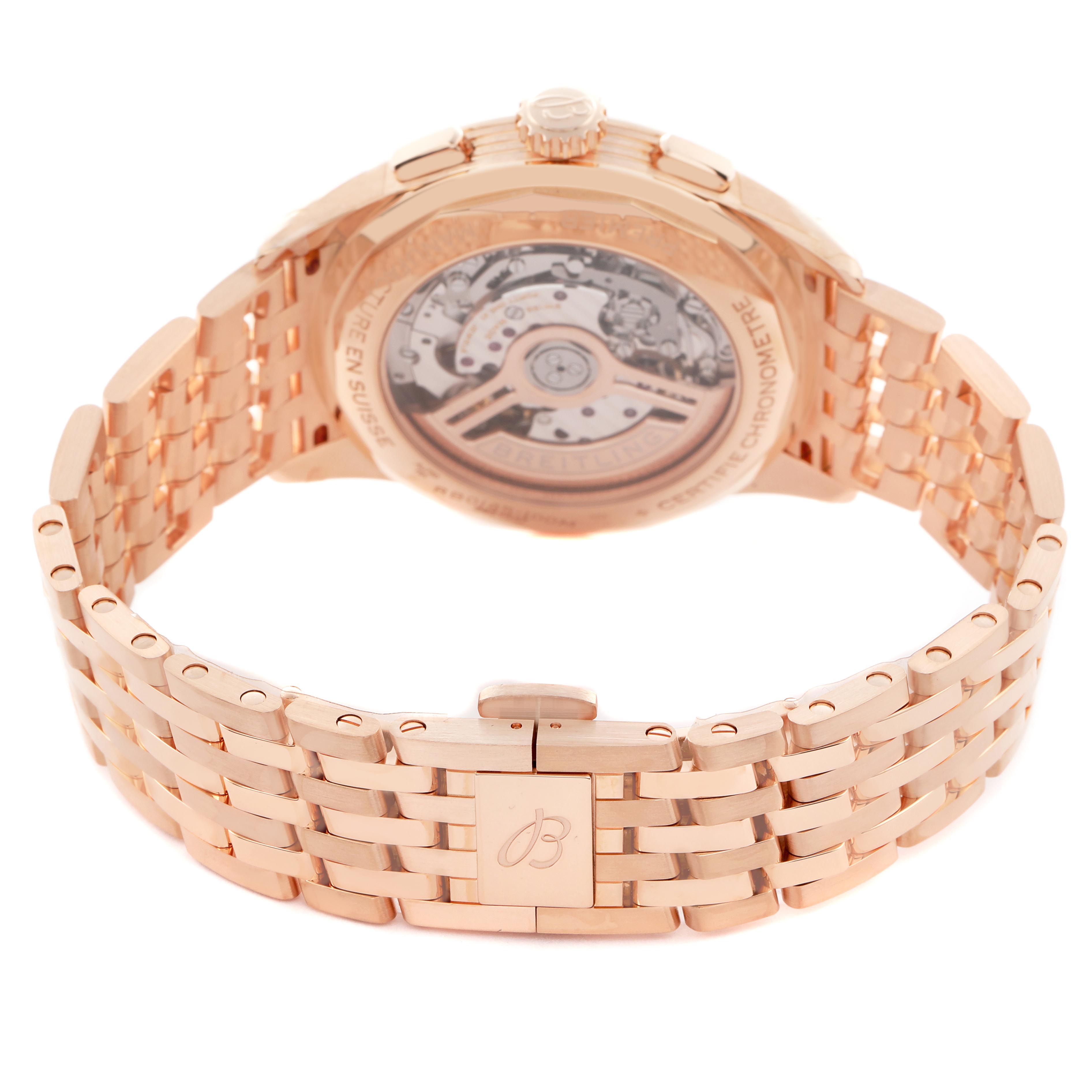 The Breitling Premier RB0145371G1R1 Men
s Rose Gold White Dial RB0145371G1R1 Men
s Rose Gold White Dial watch is shown from the back, displaying its transparent case back and rose gold bracelet.
