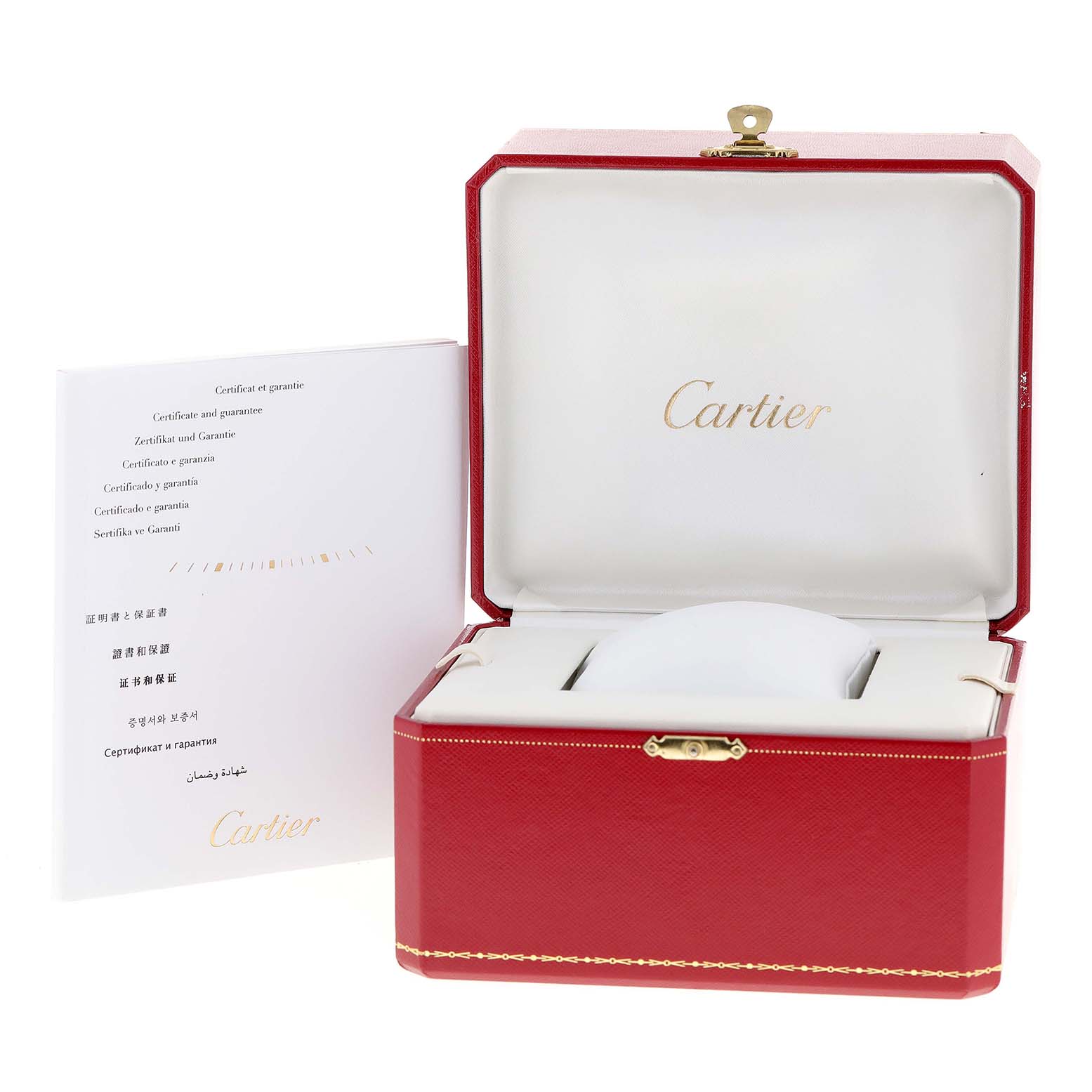 The image shows the open box and warranty booklet of a Calibre de Cartier watch by Cartier.
