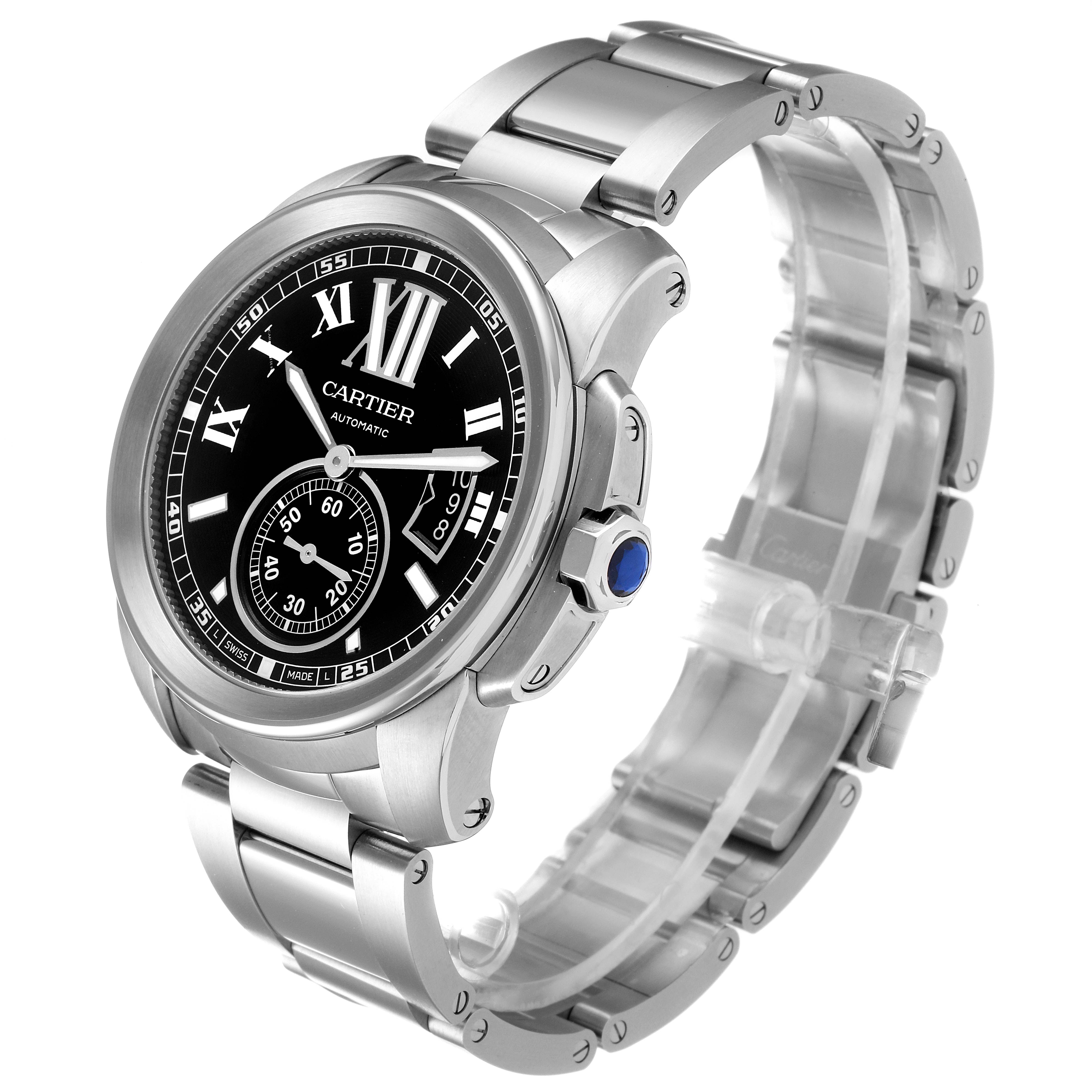 The Calibre de Cartier watch by Cartier is shown at a three-quarter angle, displaying its face, crown, and metal bracelet.