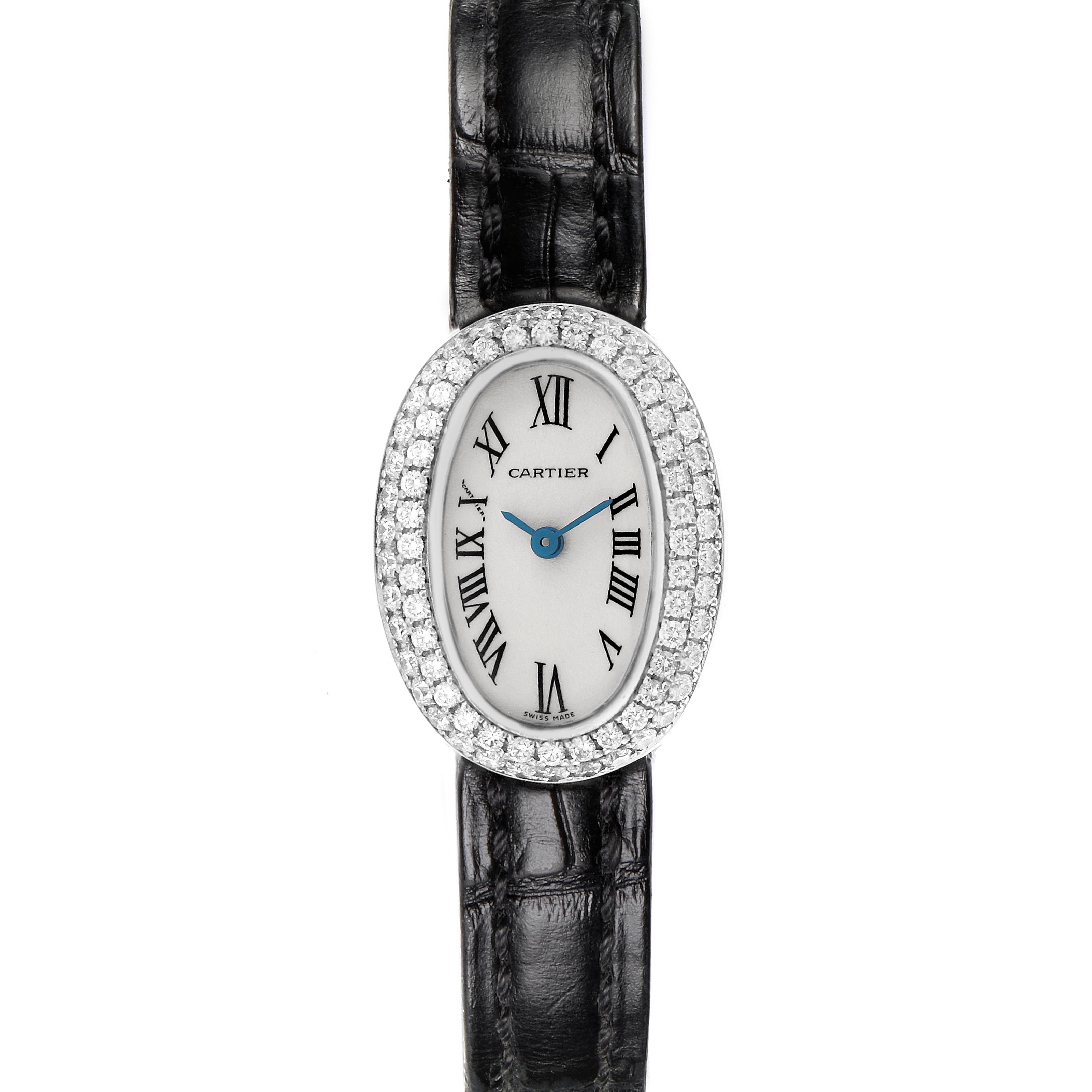 The Cartier Baignoire WB509531 Women
s White Gold White Dial WB509531 Women
s White Gold White Dial watch is shown from the front, displaying its oval face, diamond bezel, and black leather strap.