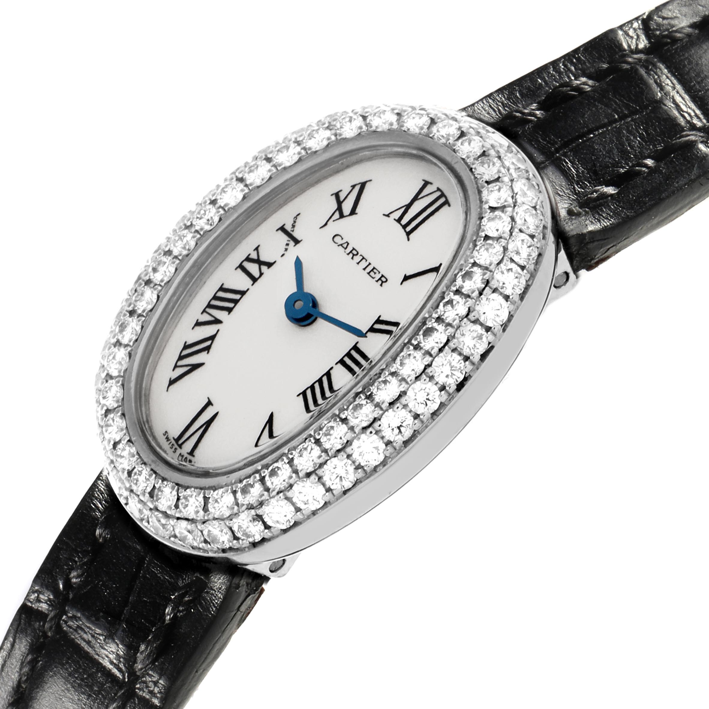 The Cartier Baignoire WB509531 Women
s White Gold White Dial WB509531 Women
s White Gold White Dial watch is shown at an angle emphasizing the diamond bezel, Roman numeral dial, and black leather strap.