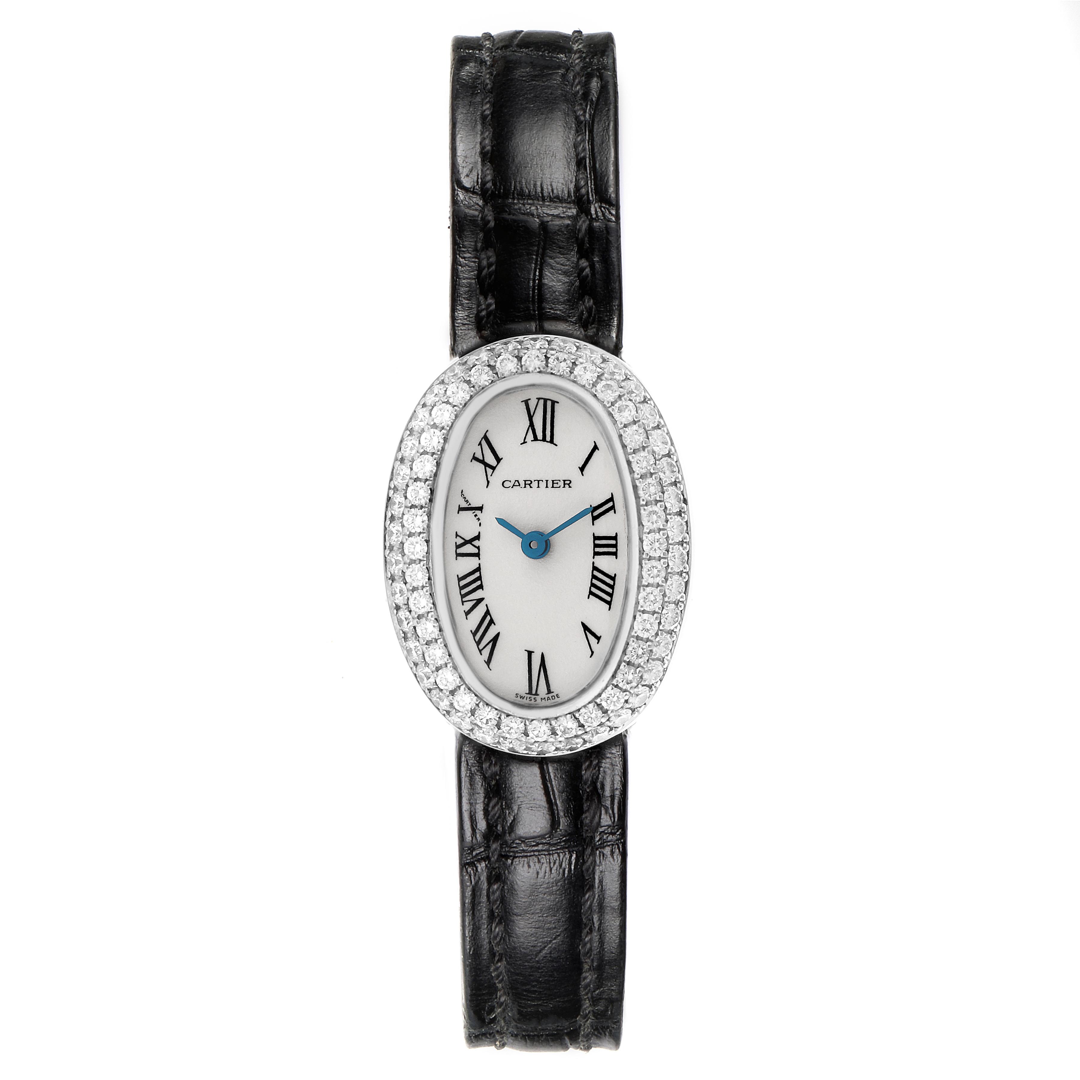 The Cartier Baignoire WB509531 Women
s White Gold White Dial WB509531 Women
s White Gold White Dial watch is shown from a top-down angle, displaying its oval face, Roman numerals, and leather strap.