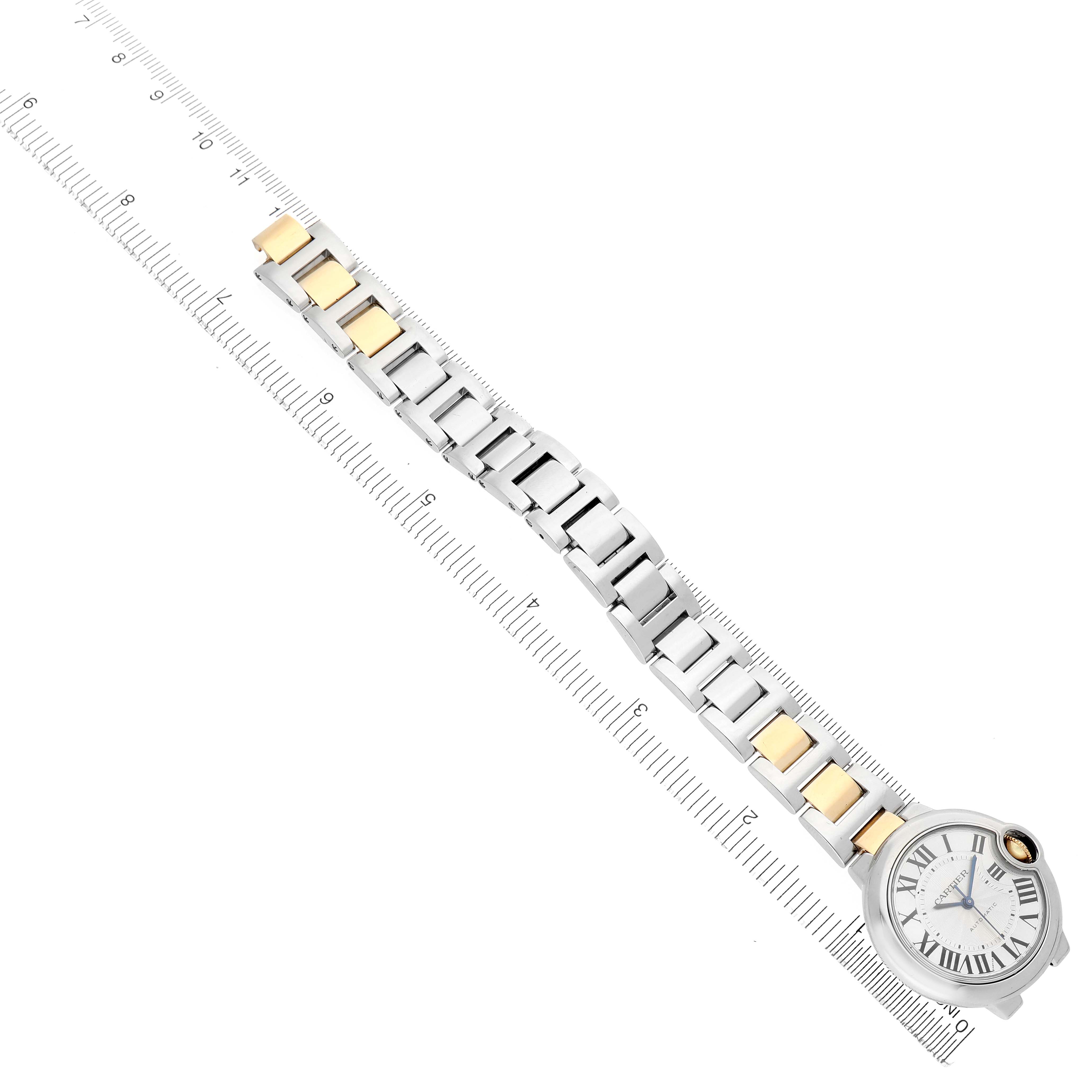 The Cartier Ballon Bleu W2BB0002 Women's Stainless Steel Silver Dial watch is shown from an above angle, highlighting the face and two-tone bracelet.