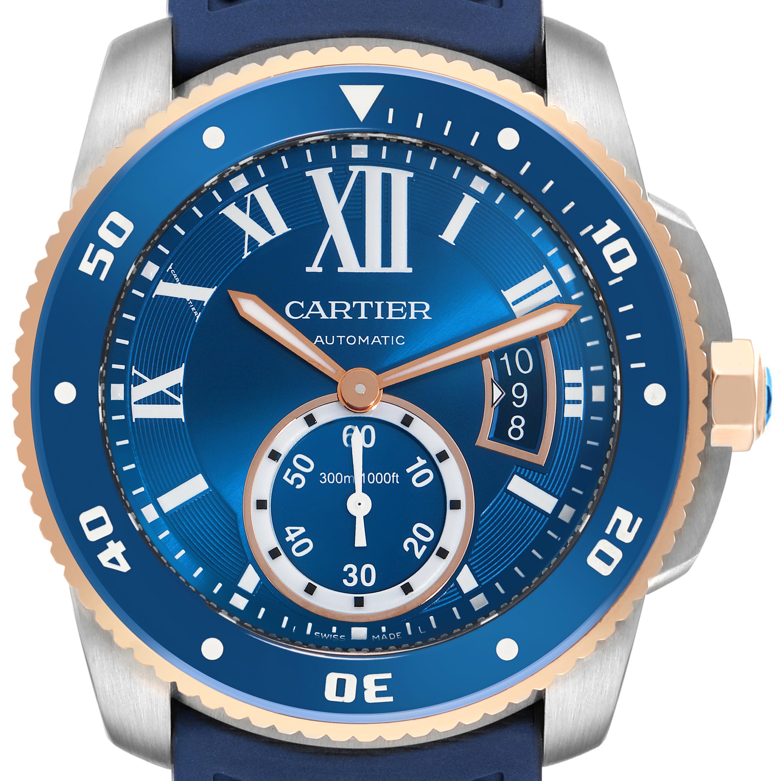 The image shows a frontal view of the Calibre de Cartier watch, highlighting its blue dial, bezel, hands, and numeric markers.