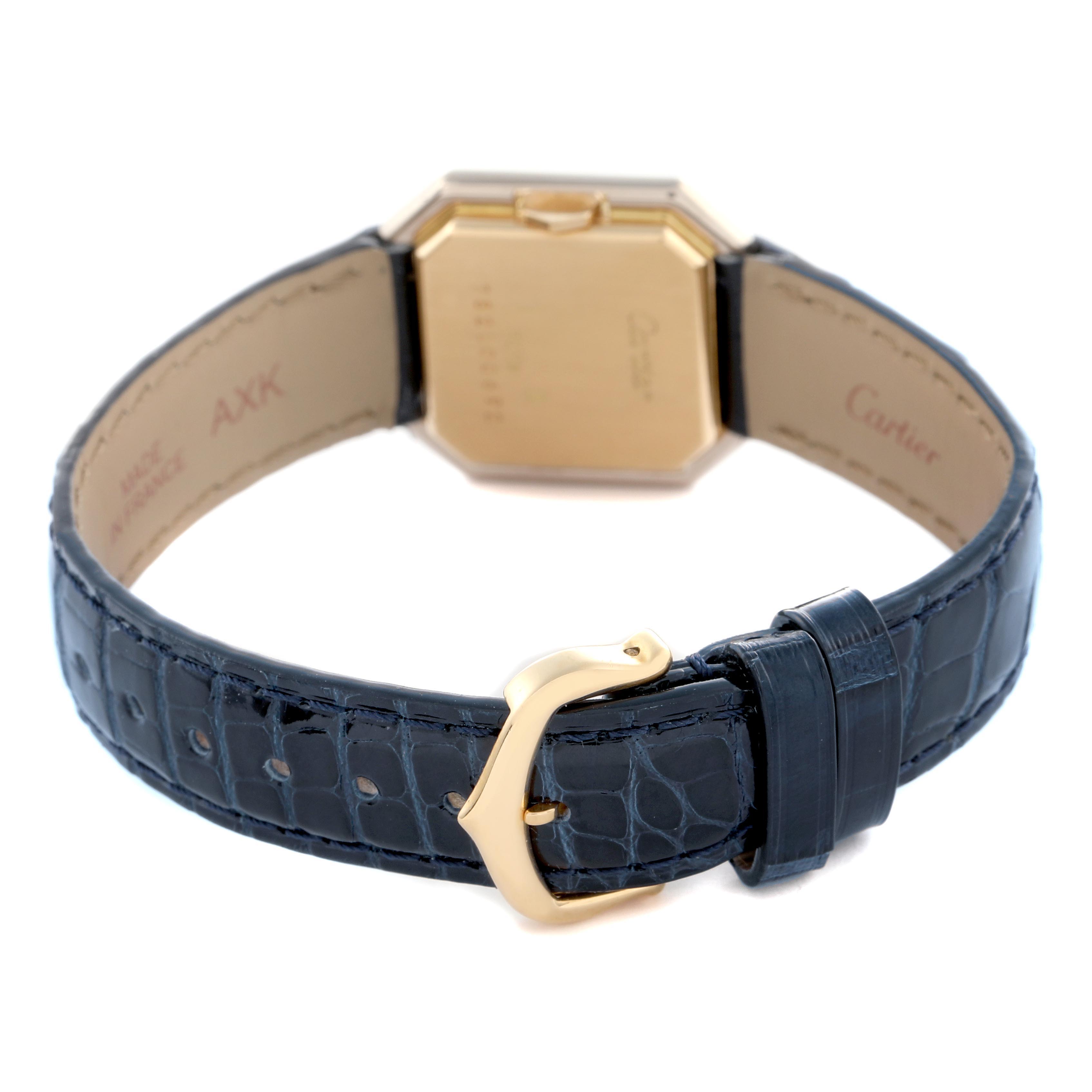 The image shows the Cartier Ceinture 78100 Women
s Steel and Gold (two tone) White Dial 78100 Women
s Steel and Gold (two tone) White Dial watch from the back, highlighting its leather strap and gold buckle.