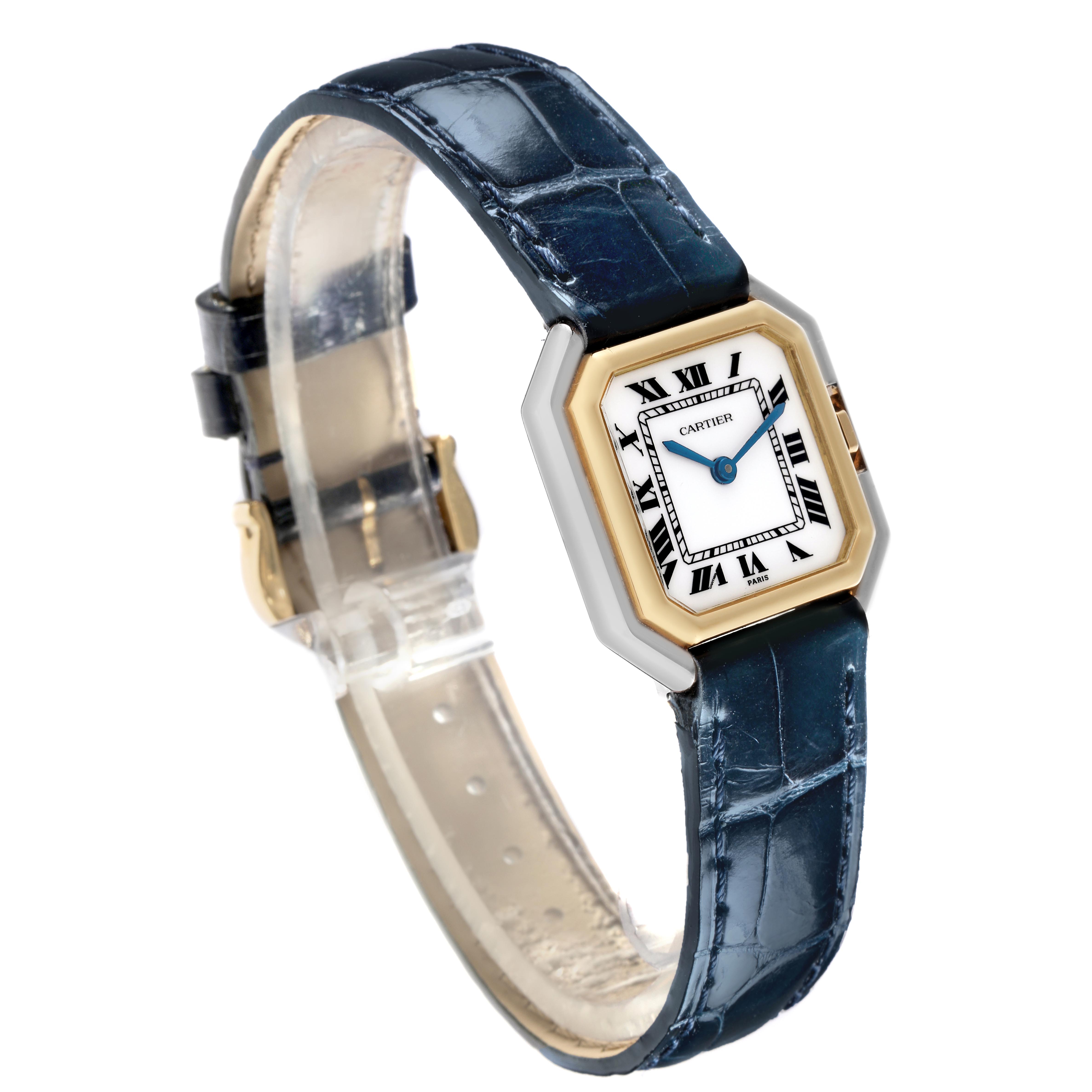 The Cartier Ceinture 78100 Women
s Steel and Gold (two tone) White Dial 78100 Women
s Steel and Gold (two tone) White Dial watch is shown at an angled view, highlighting the hexagonal case, face, and leather strap.