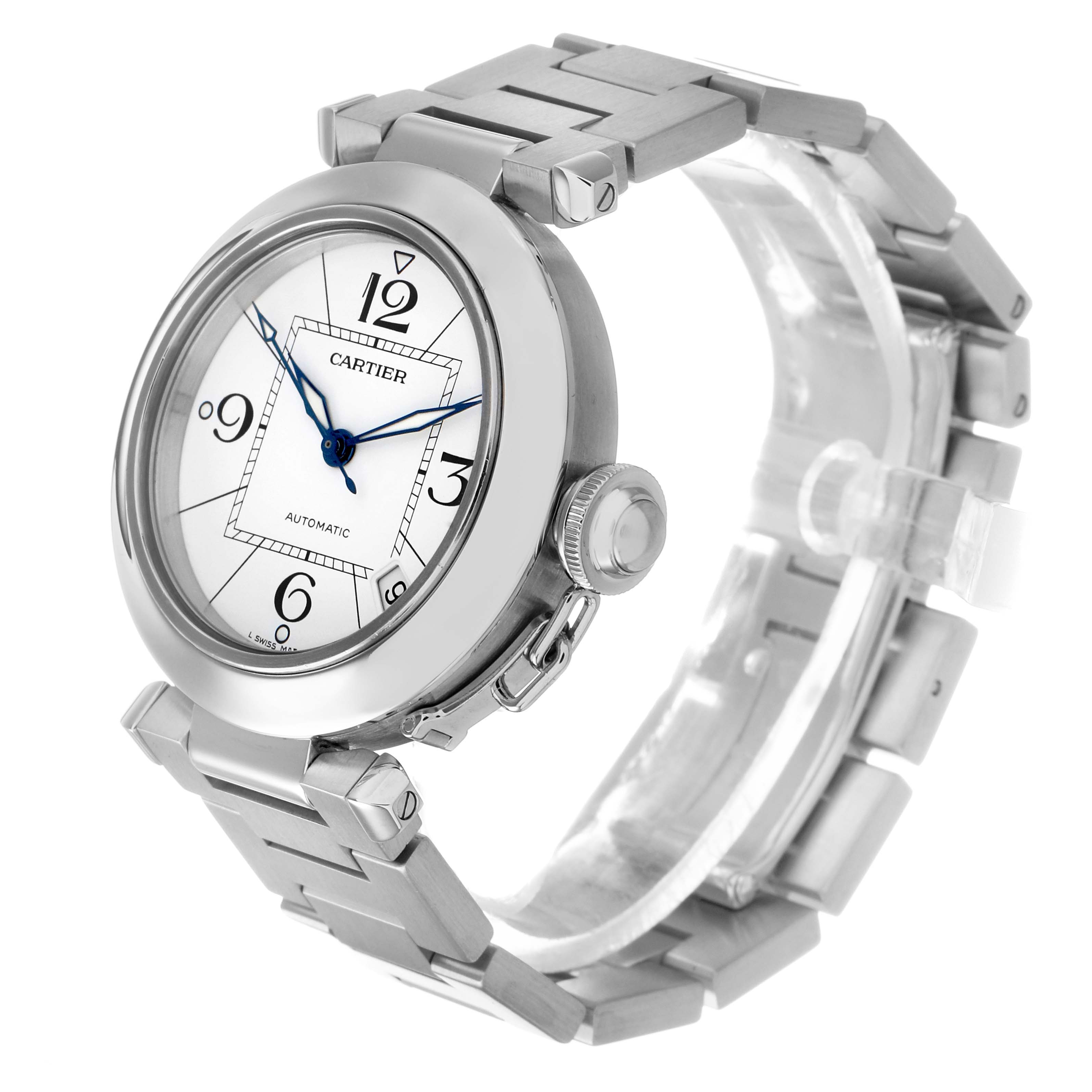 The Cartier Pasha W31074M7 Men's Stainless Steel White Dial watch is shown at a three-quarter angle, highlighting its round face, crown, and bracelet.