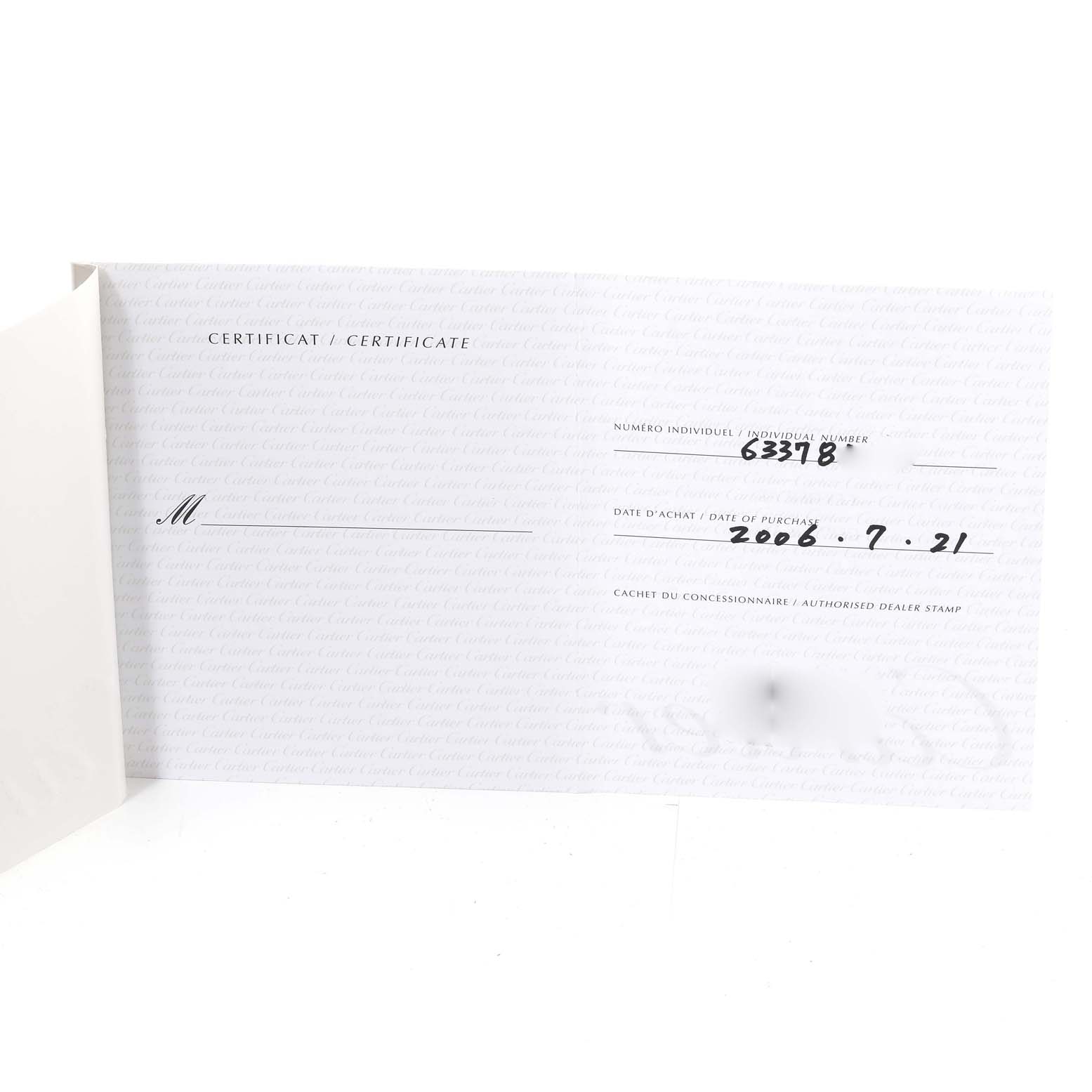 This image shows the certificate of authenticity for the Roadster model by Cartier, including the purchase date and serial number.