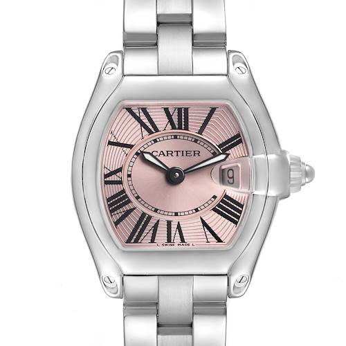 The Cartier Roadster W62017V3 Women's Stainless Steel Pink Dial watch is shown from the front, highlighting its pink dial, roman numerals, and metal bracelet.