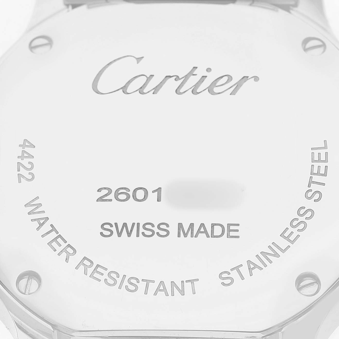 The image shows the back case of the Ronde model by Cartier, featuring engravings like "Swiss Made" and "Water Resistant."